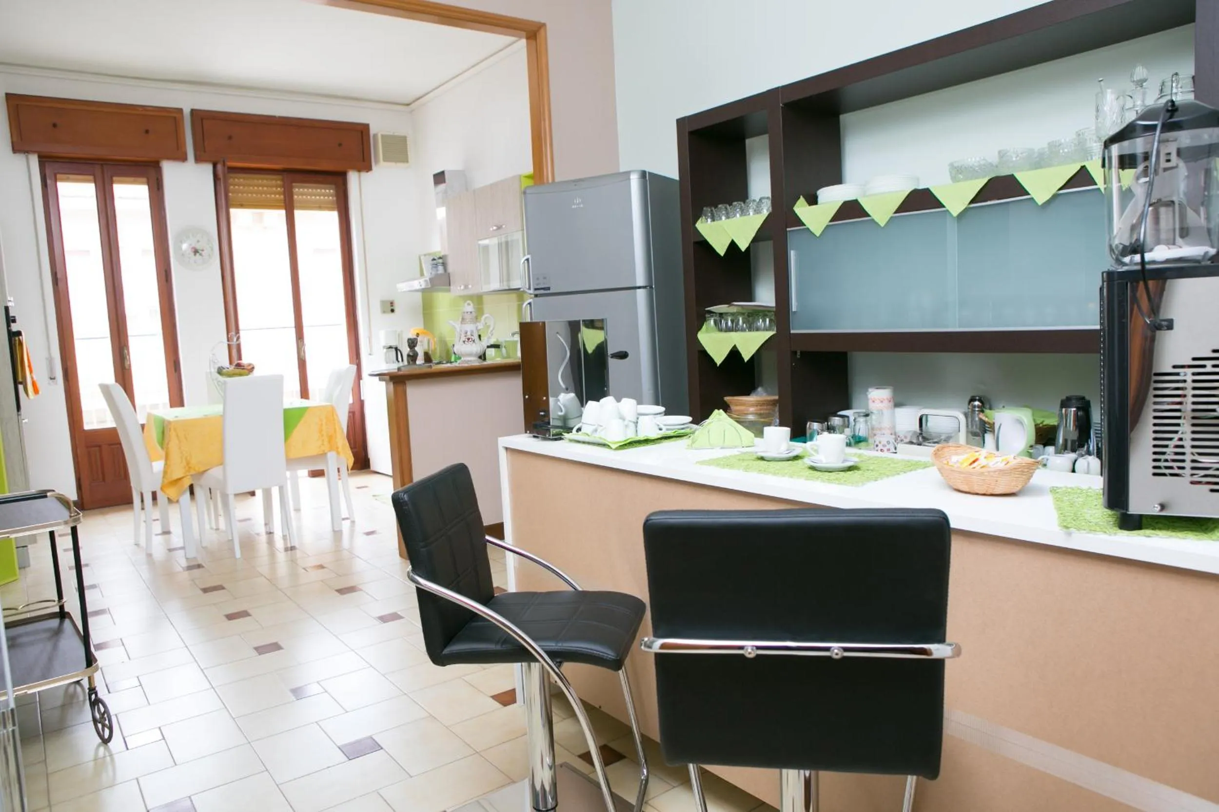 Communal kitchen in B&B The Queen