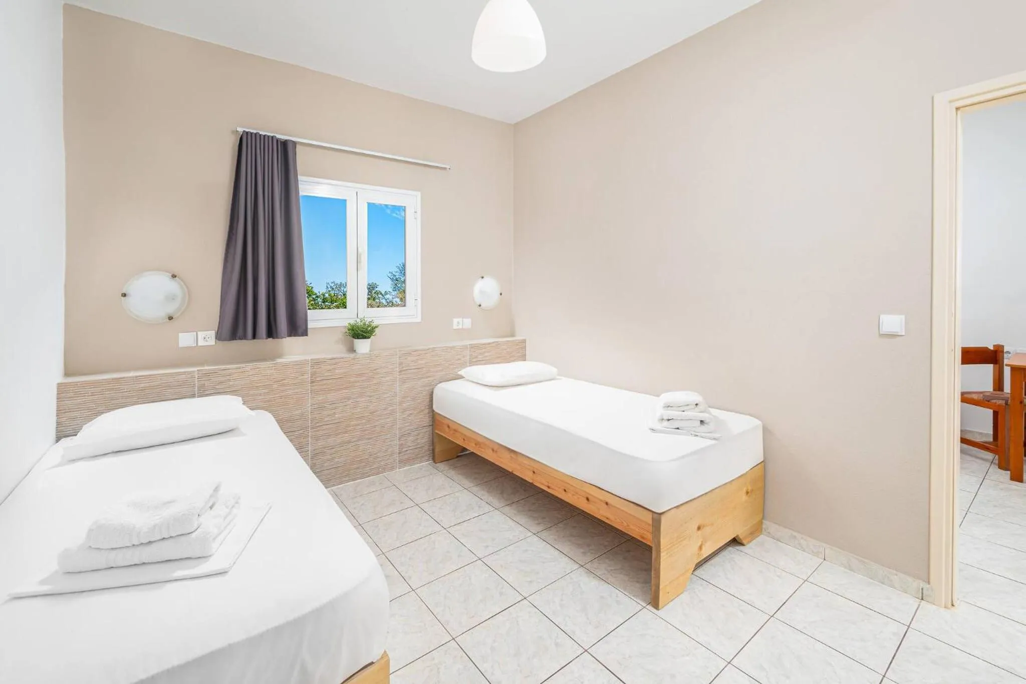 Bed in Mylos Apartments Anissaras