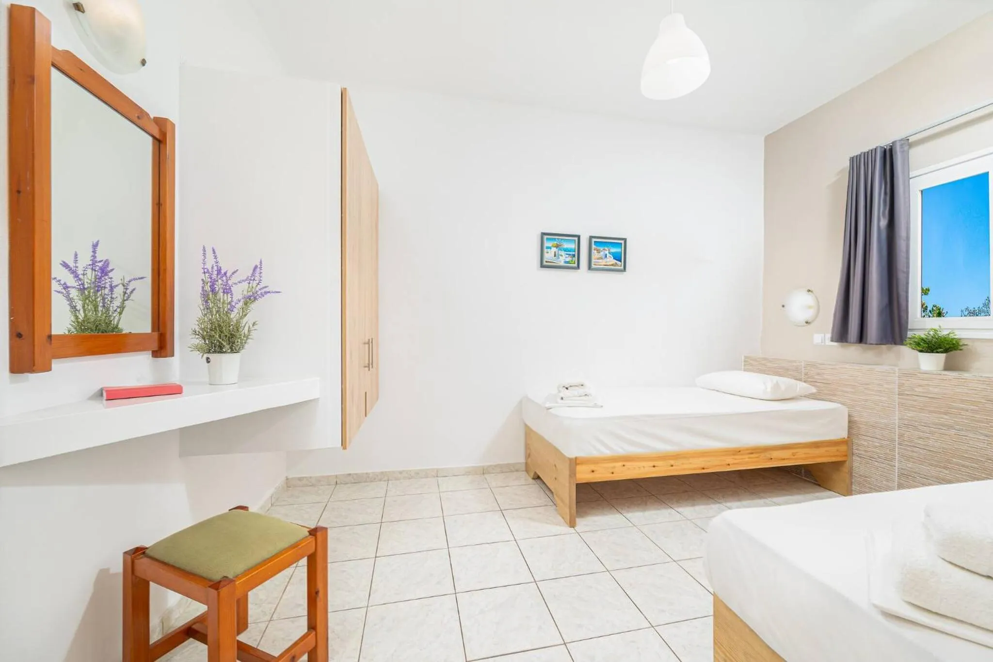 Bed in Mylos Apartments Anissaras