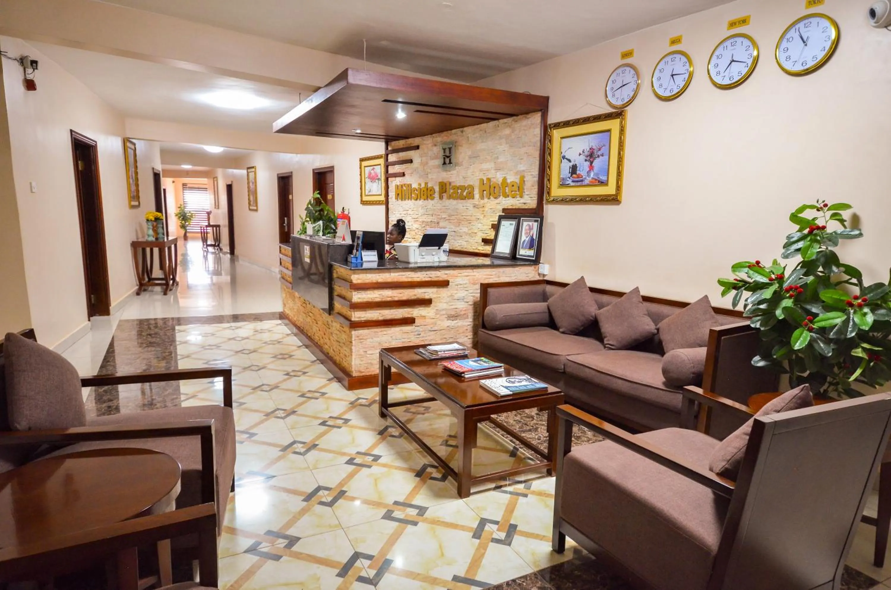 Communal lounge/ TV room in Hillside Plaza Hotel