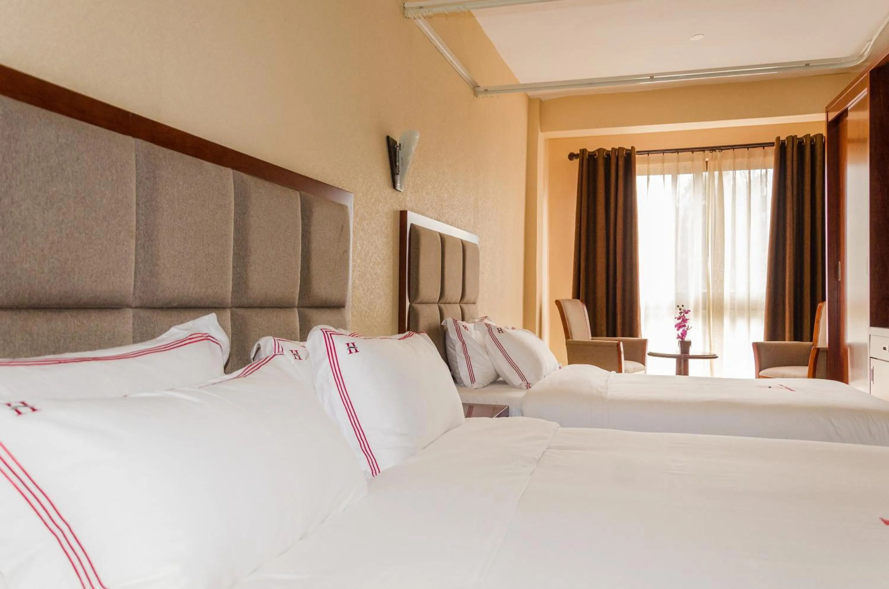 Bedroom in Hillside Plaza Hotel