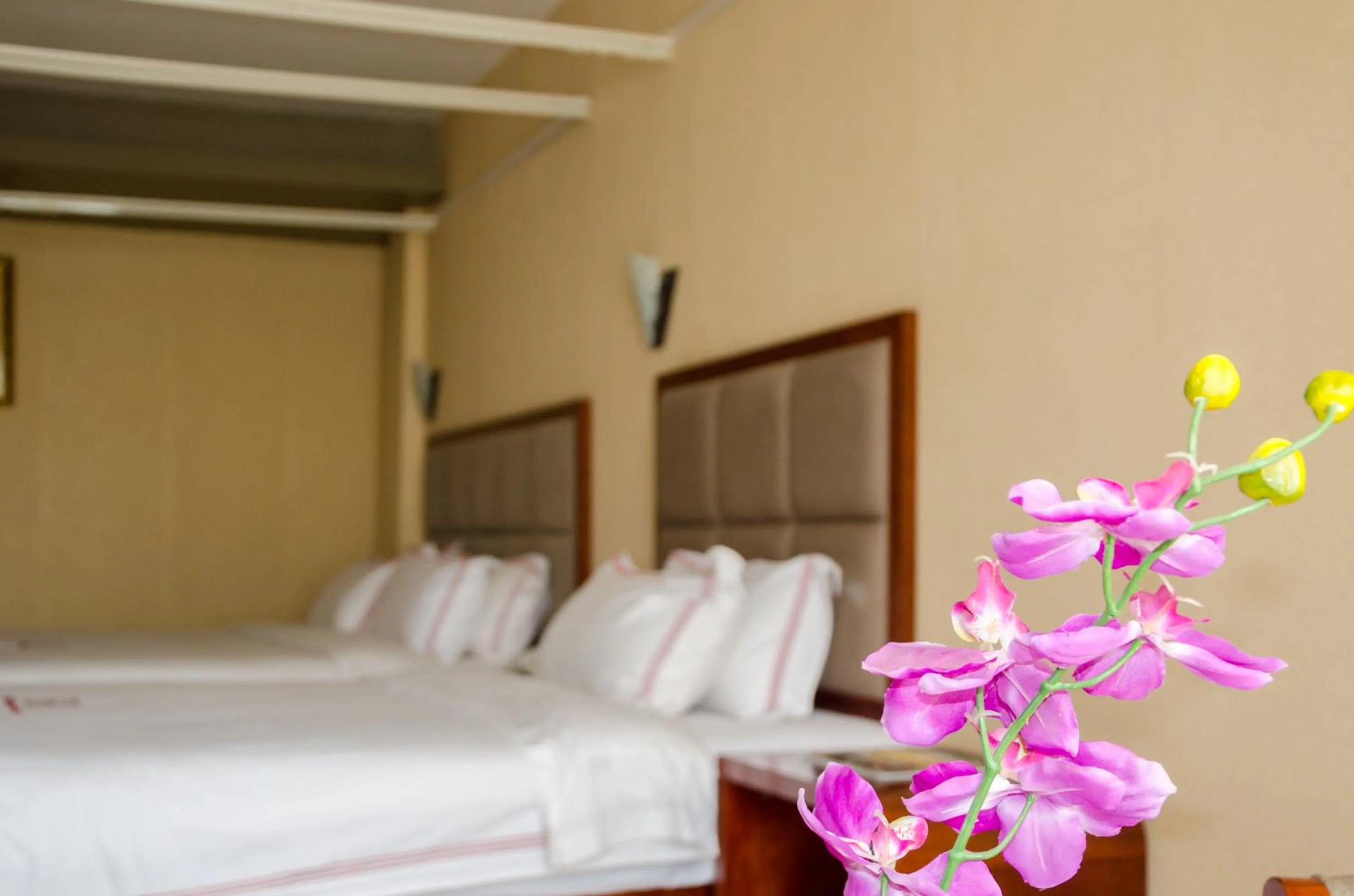 Bedroom in Hillside Plaza Hotel