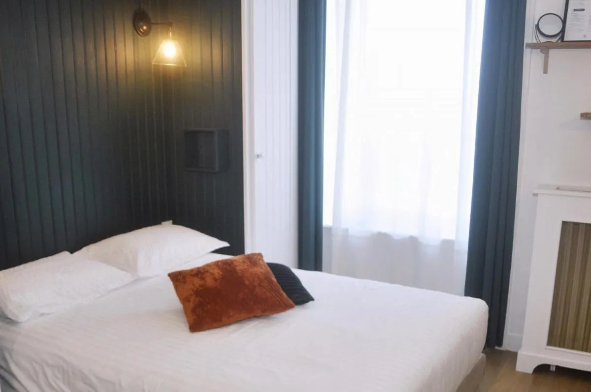 Photo of the whole room, Bed in Hôtel Le Tiburon