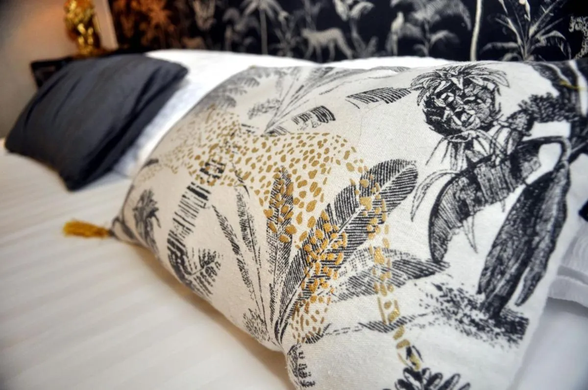 Photo of the whole room, Bed in Hôtel Le Tiburon