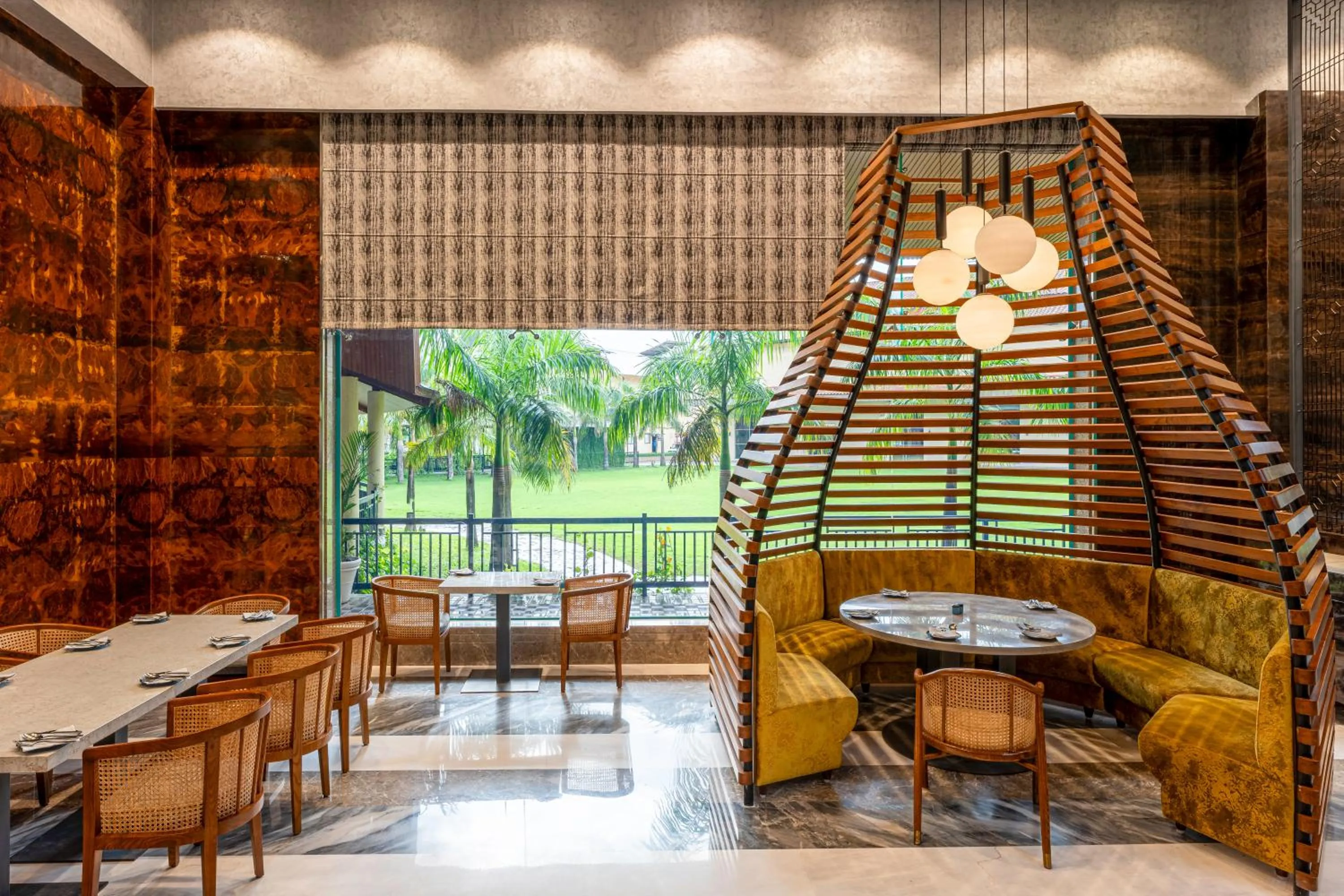 Dining area in Radisson Blu Plaza Resort & Convention Centre Karjat