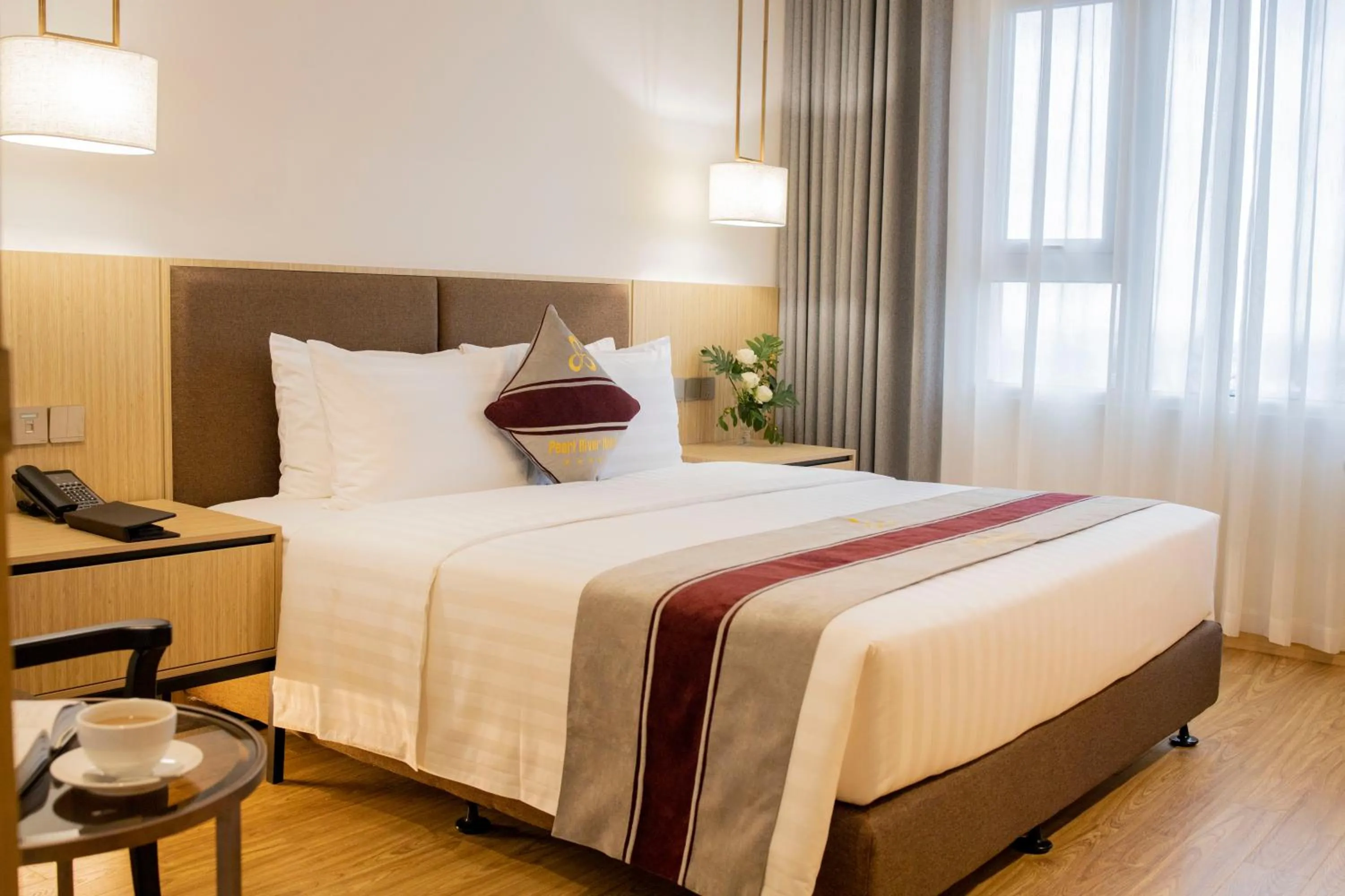 Bed in Pearl River Hotel