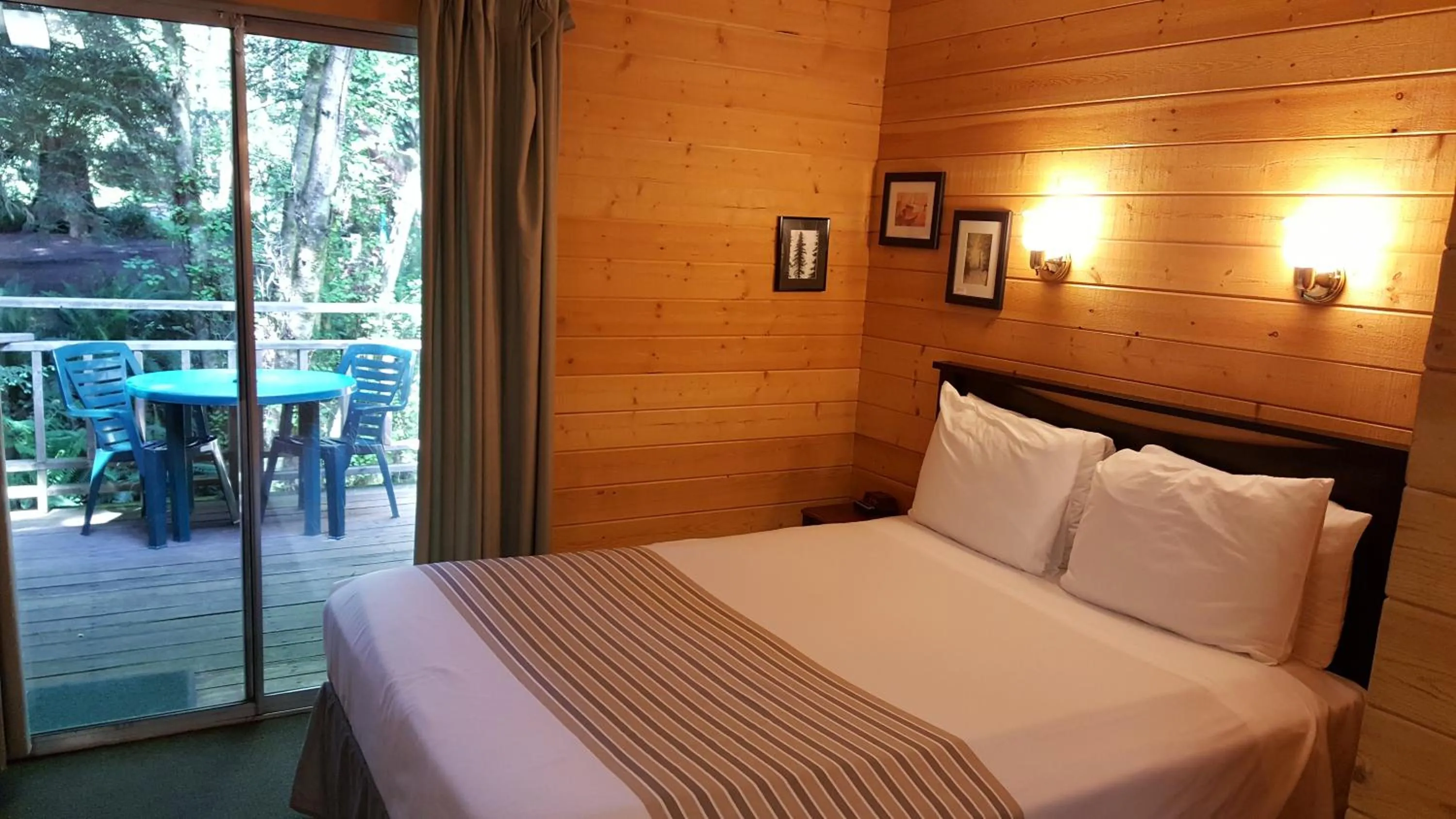 Bed in Emerald Forest Cabins