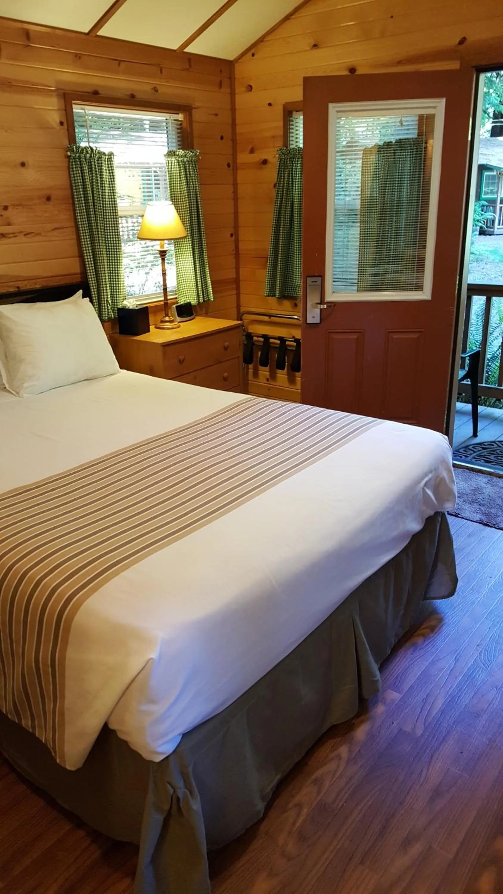 Bed in Emerald Forest Cabins