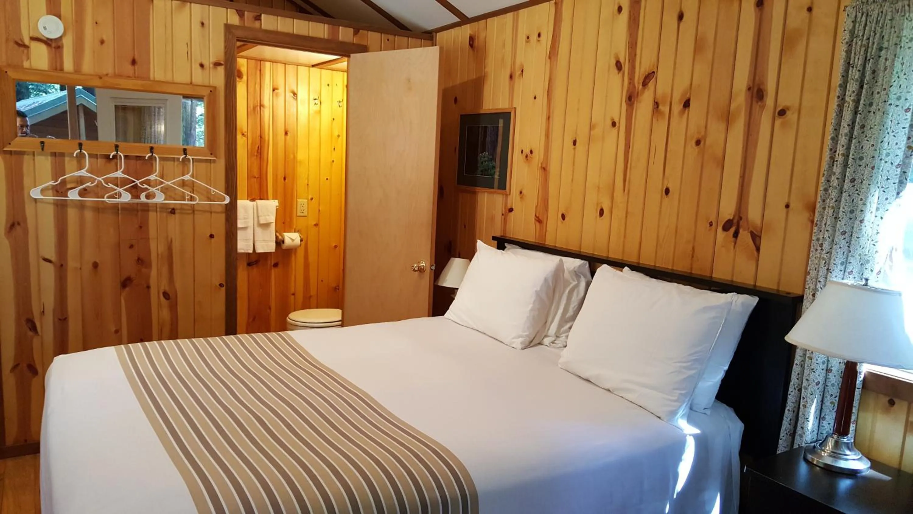 Bed in Emerald Forest Cabins