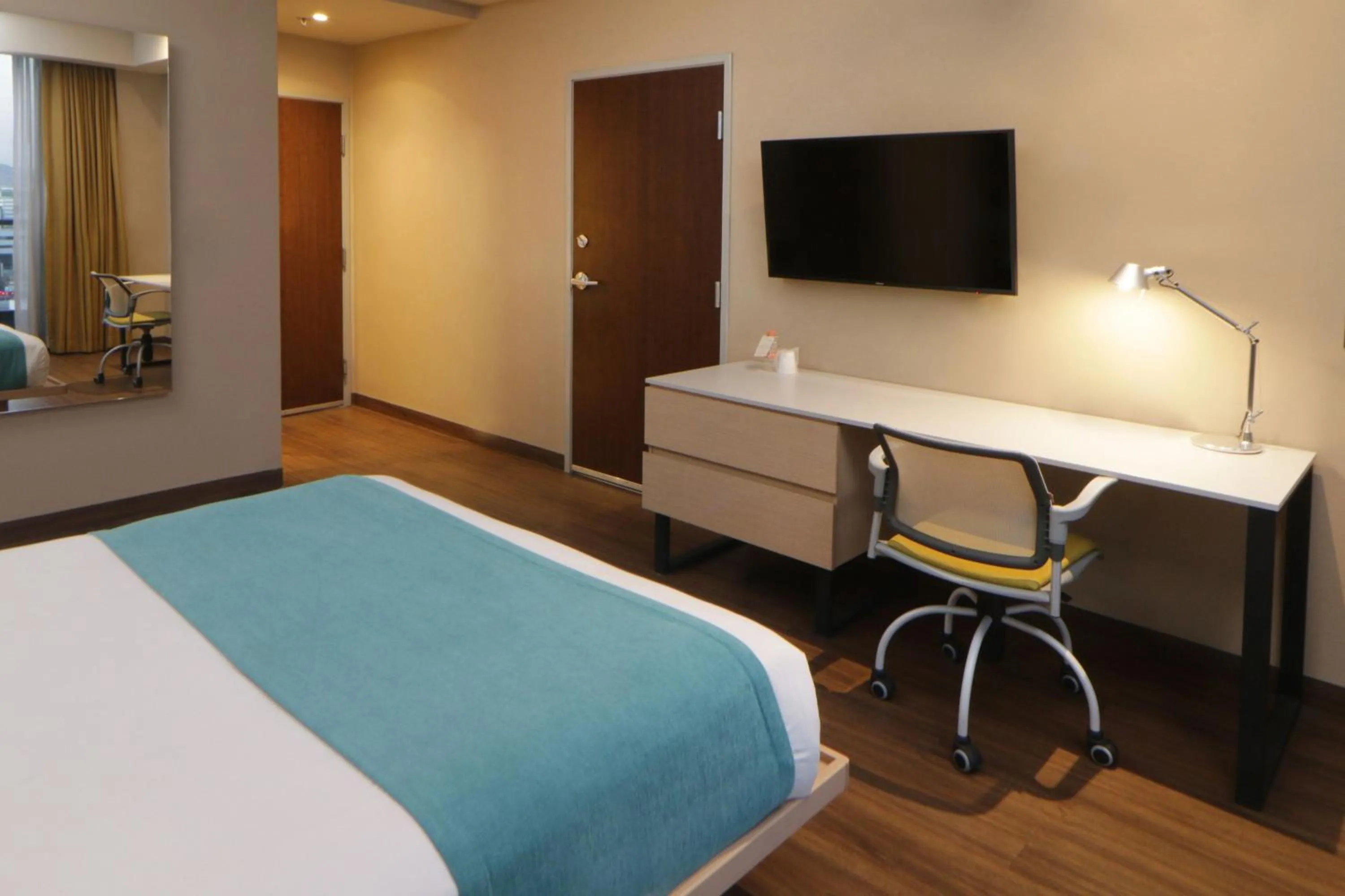 Bedroom, Bed in City Express Suites by Marriott Tijuana Rio