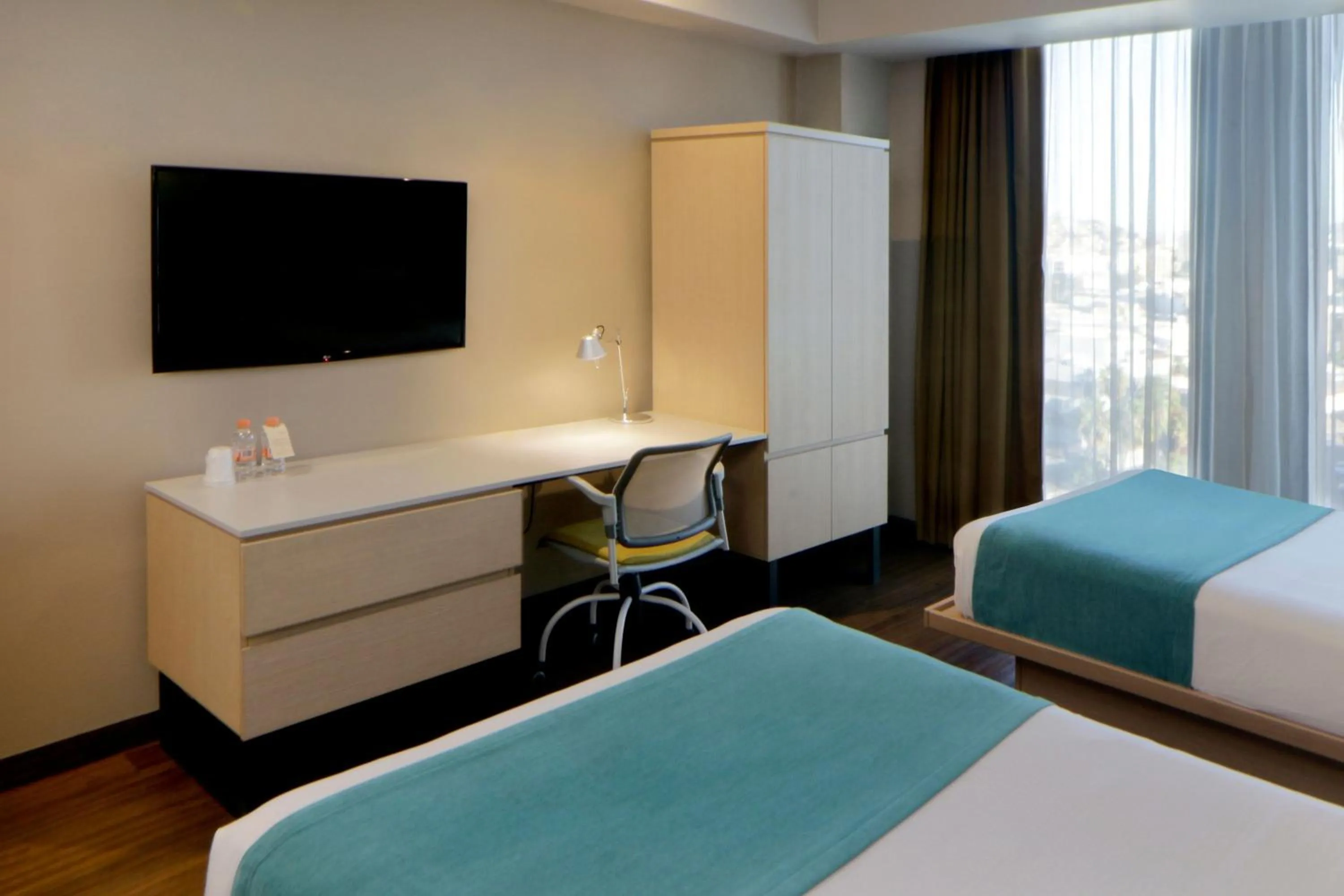 Bedroom, Bed in City Express Suites by Marriott Tijuana Rio