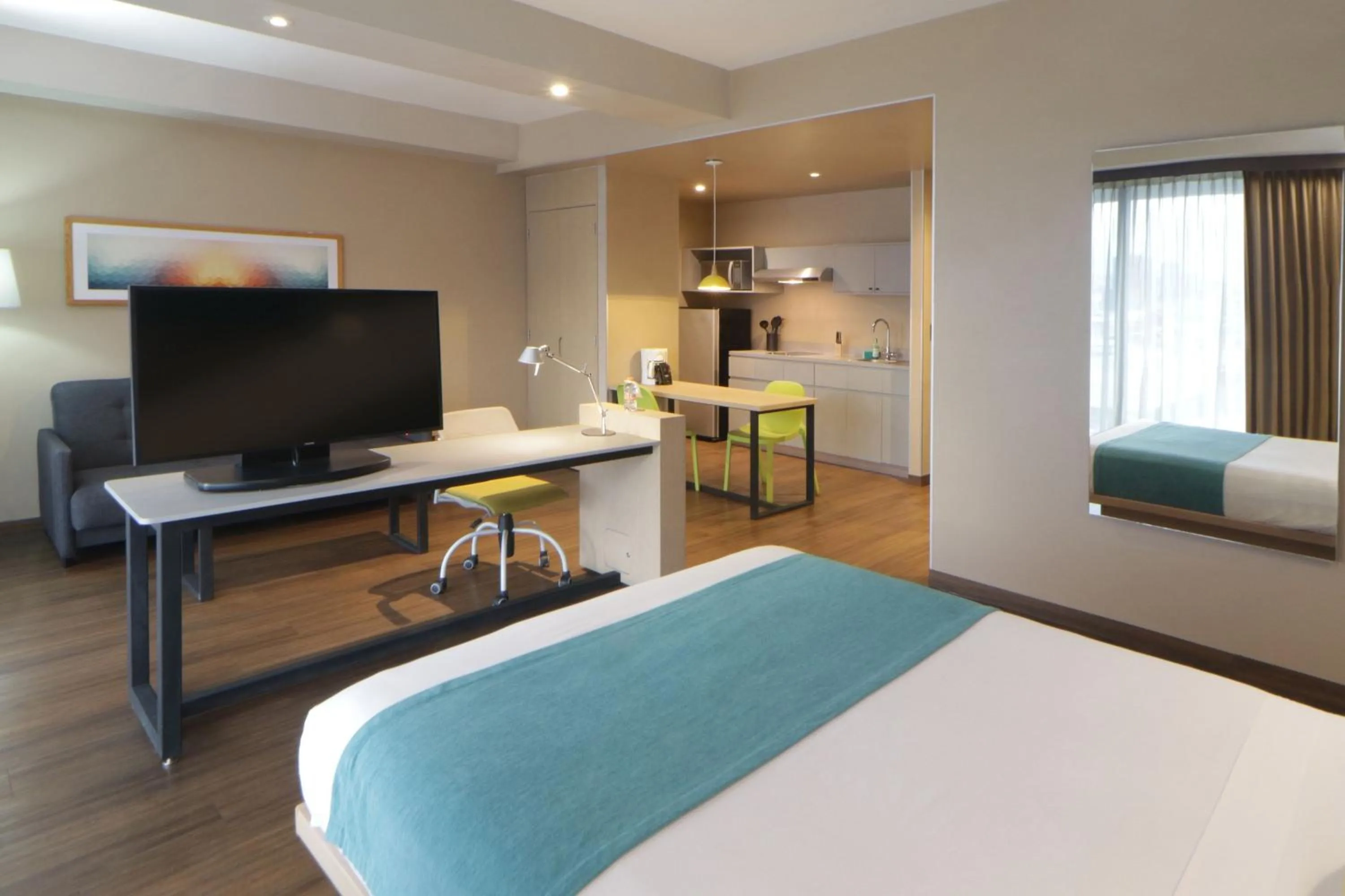 Bedroom, Bed in City Express Suites by Marriott Tijuana Rio