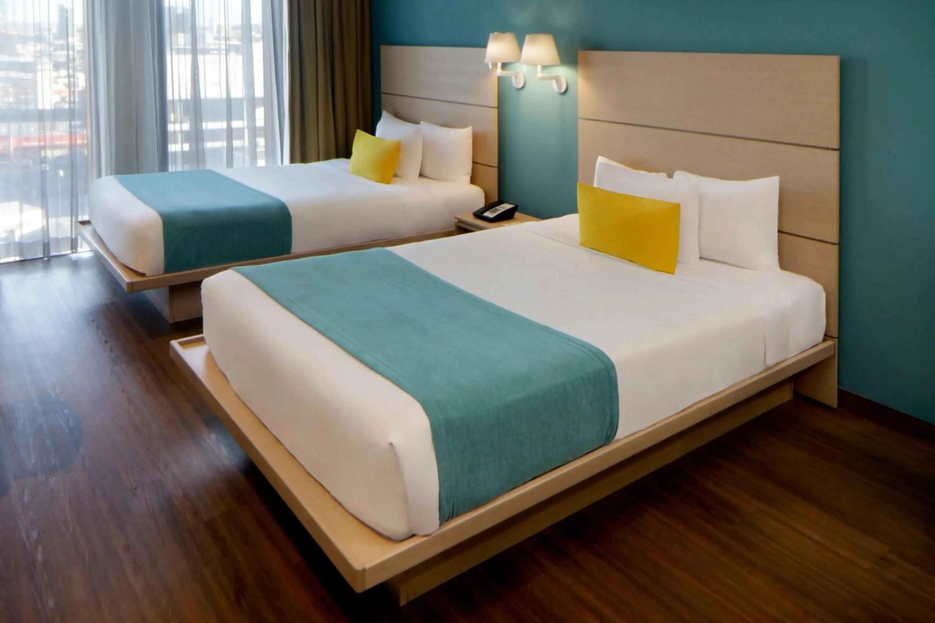 Bedroom, Bed in City Express Suites by Marriott Tijuana Rio