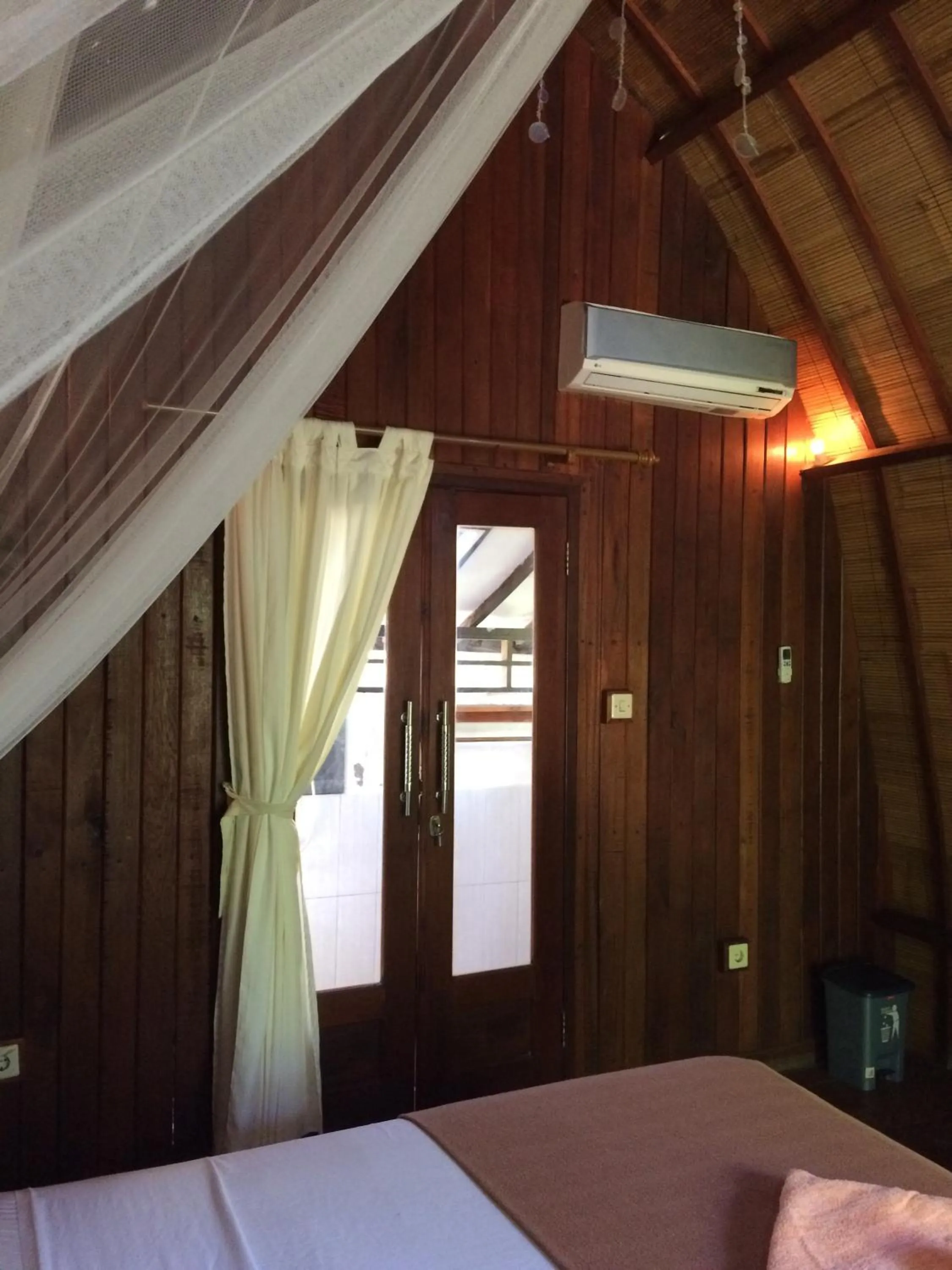 Bed in Melati Cottage