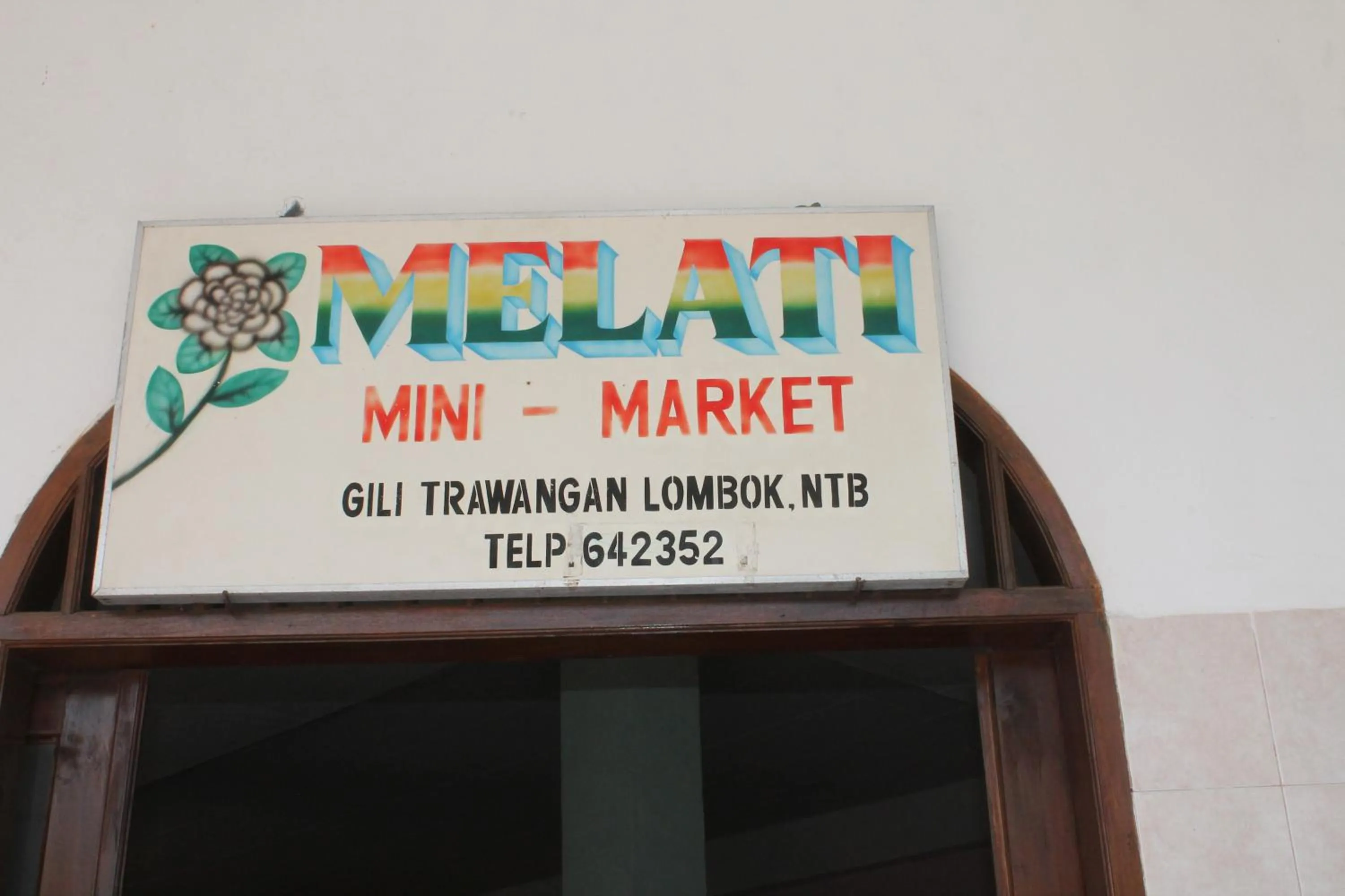 Property logo or sign in Melati Cottage