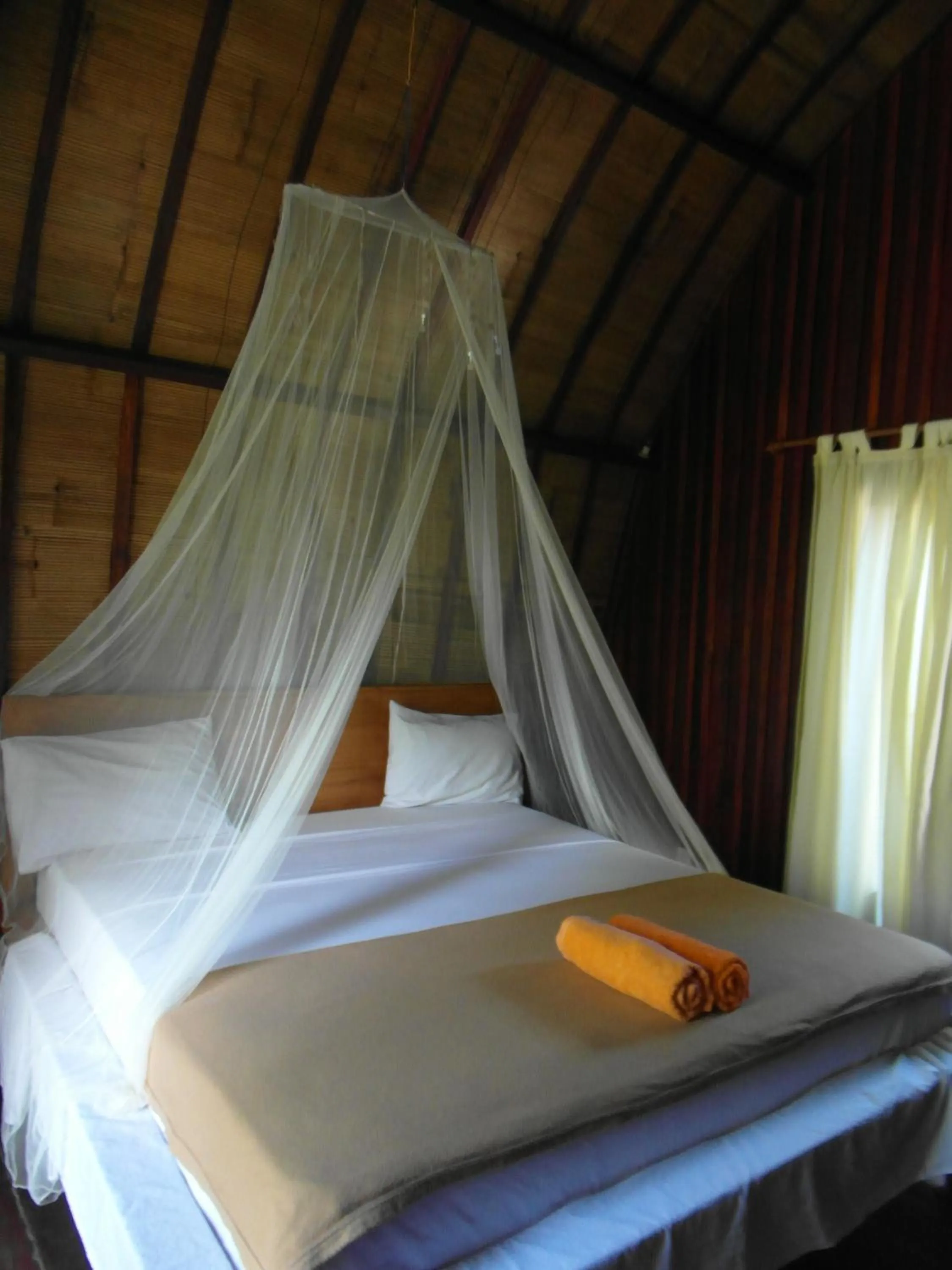 Photo of the whole room, Bed in Melati Cottage