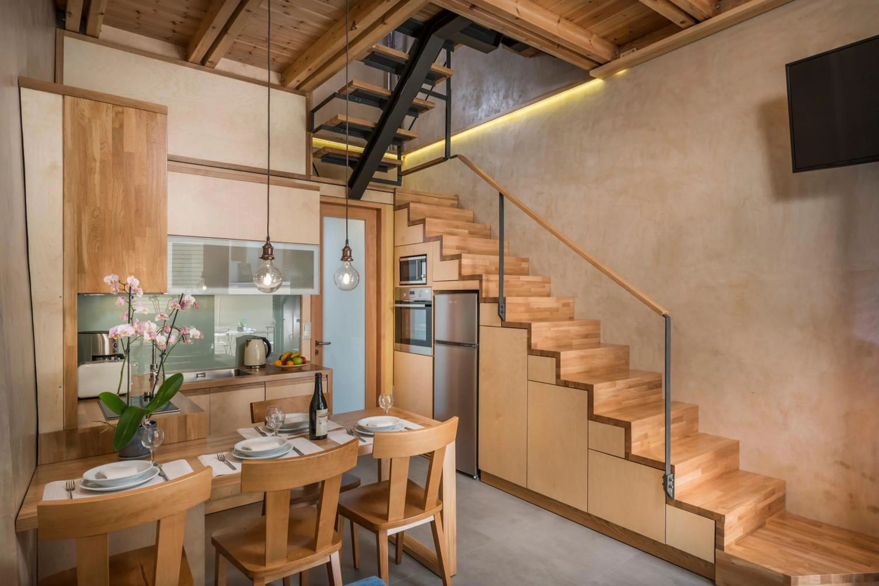 Dining area in Neoria Houses
