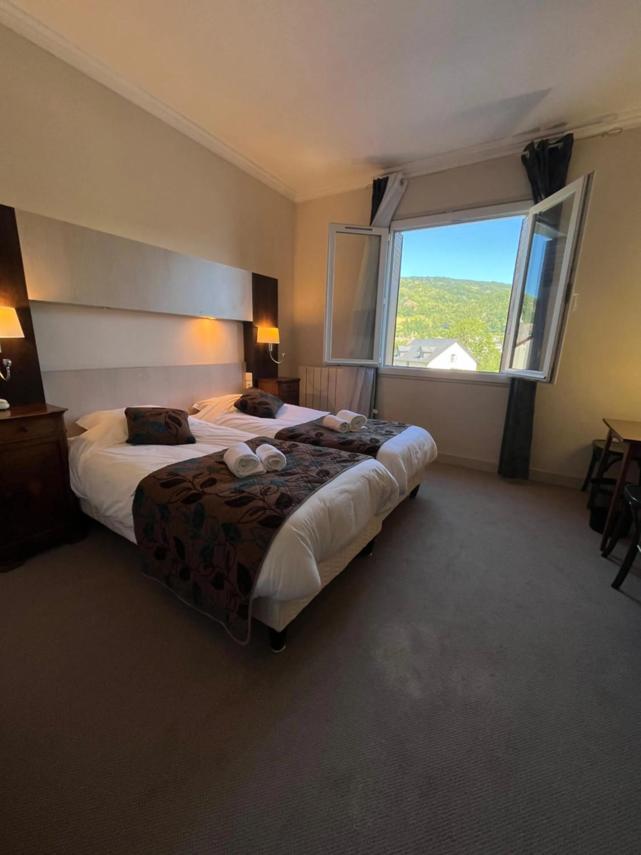 Bed in Logis Hôtel restaurant Bel Horizon