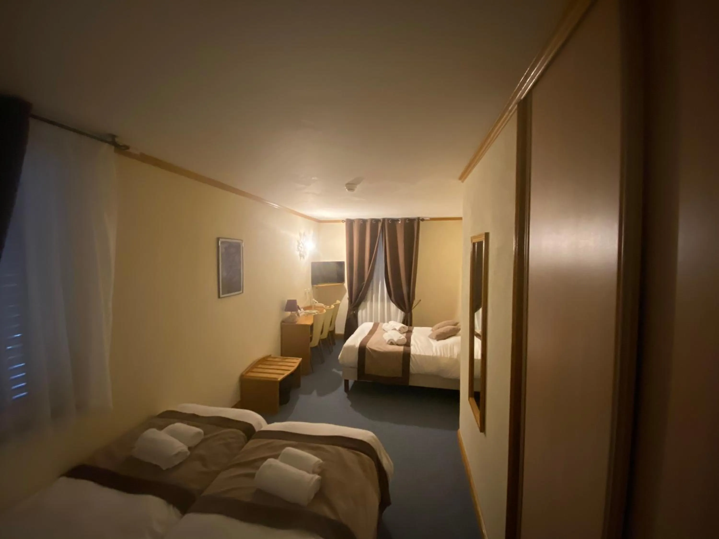 Bed in Logis Hôtel restaurant Bel Horizon