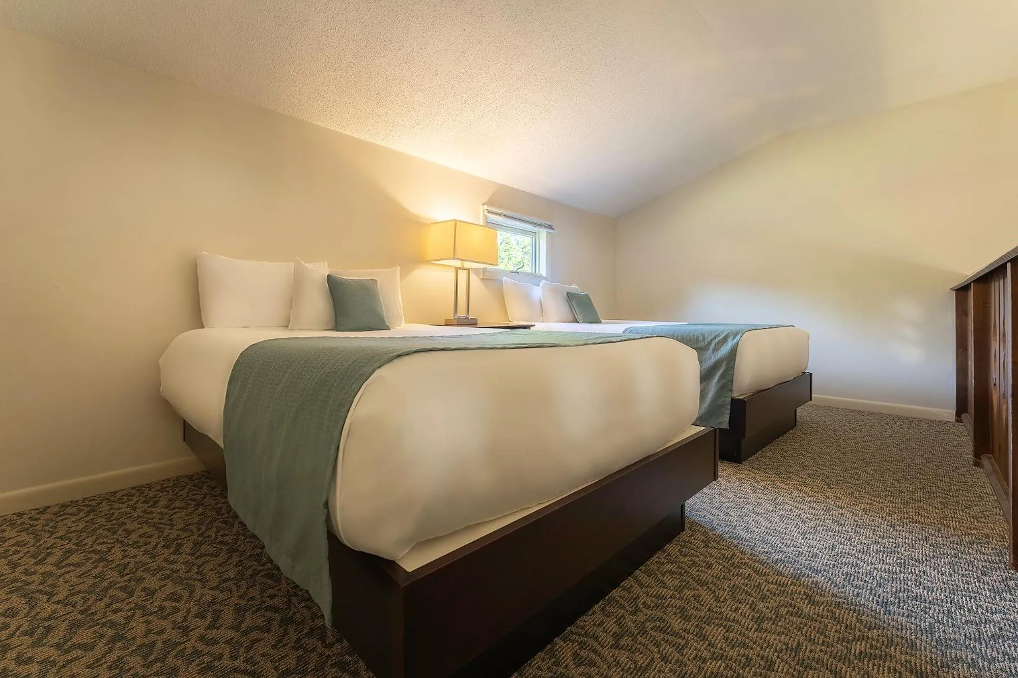 Bed in Sun & Ski Inn and Suites