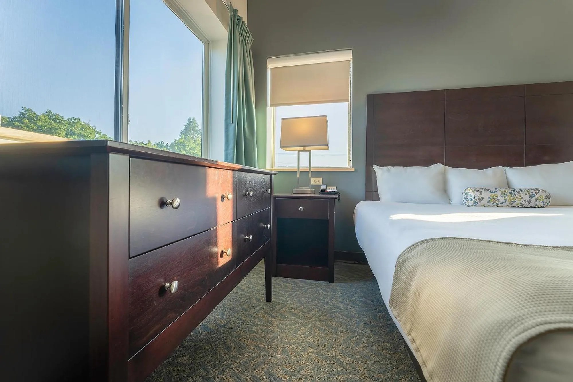 Bed in Sun & Ski Inn and Suites