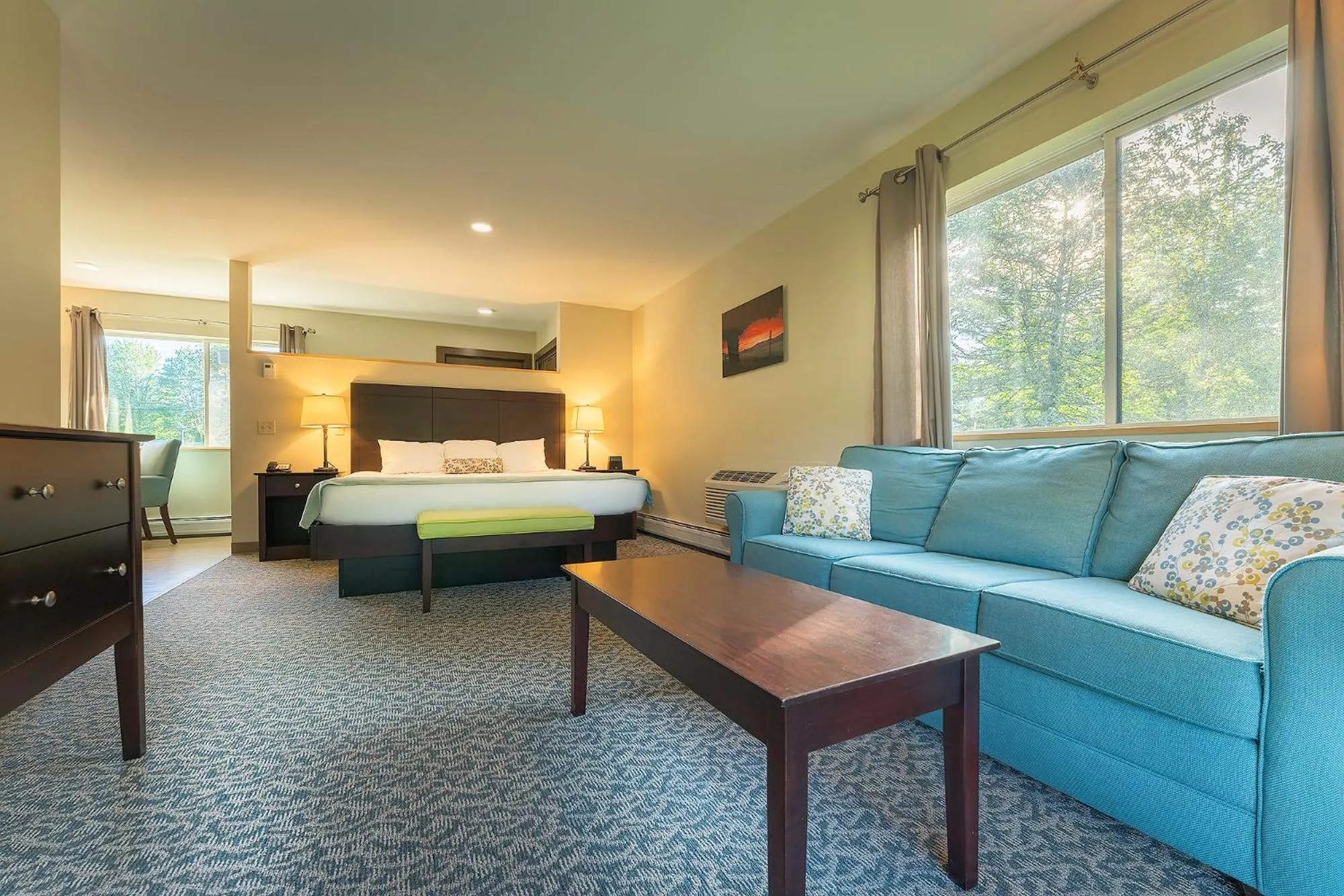 Bed in Sun & Ski Inn and Suites