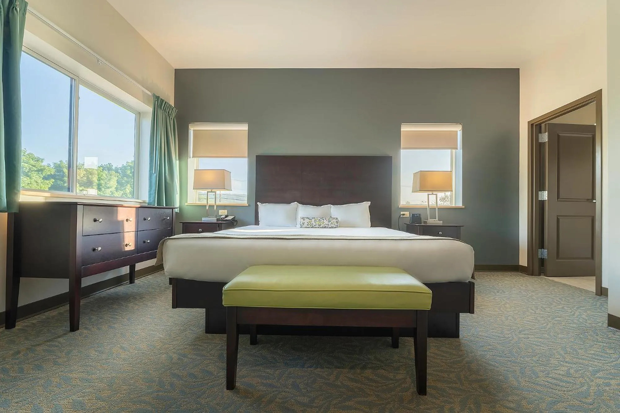 Bed in Sun & Ski Inn and Suites