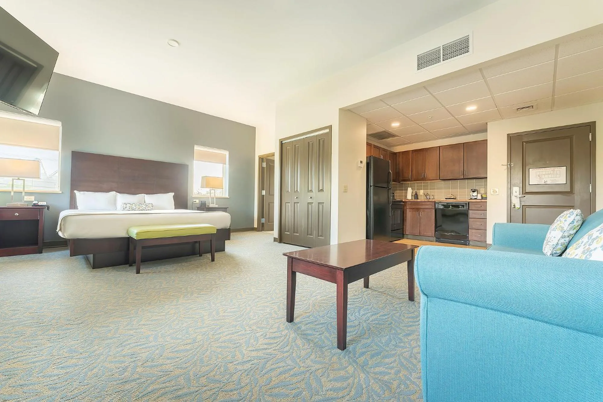 Bed in Sun & Ski Inn and Suites