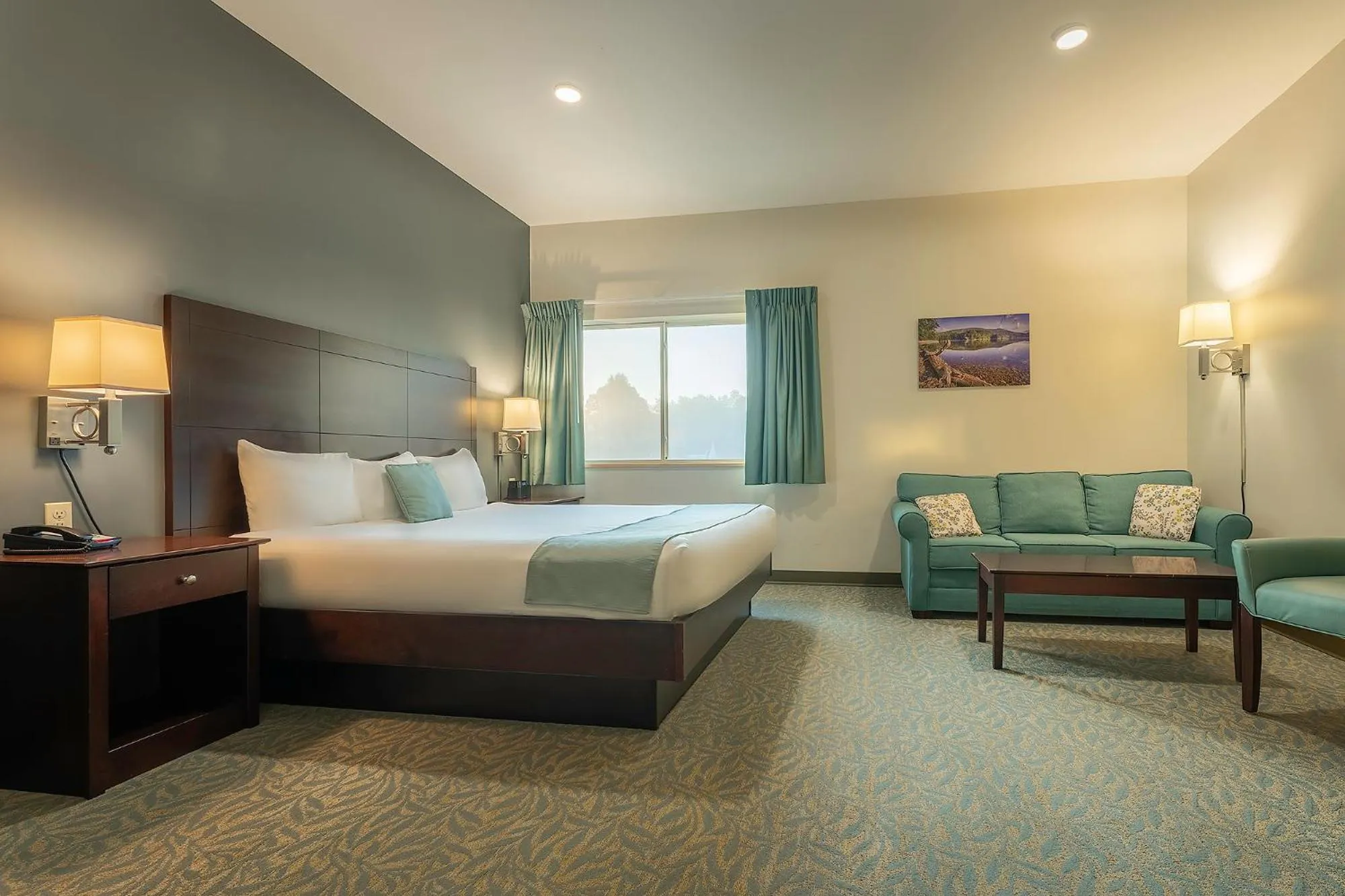 Bed in Sun & Ski Inn and Suites