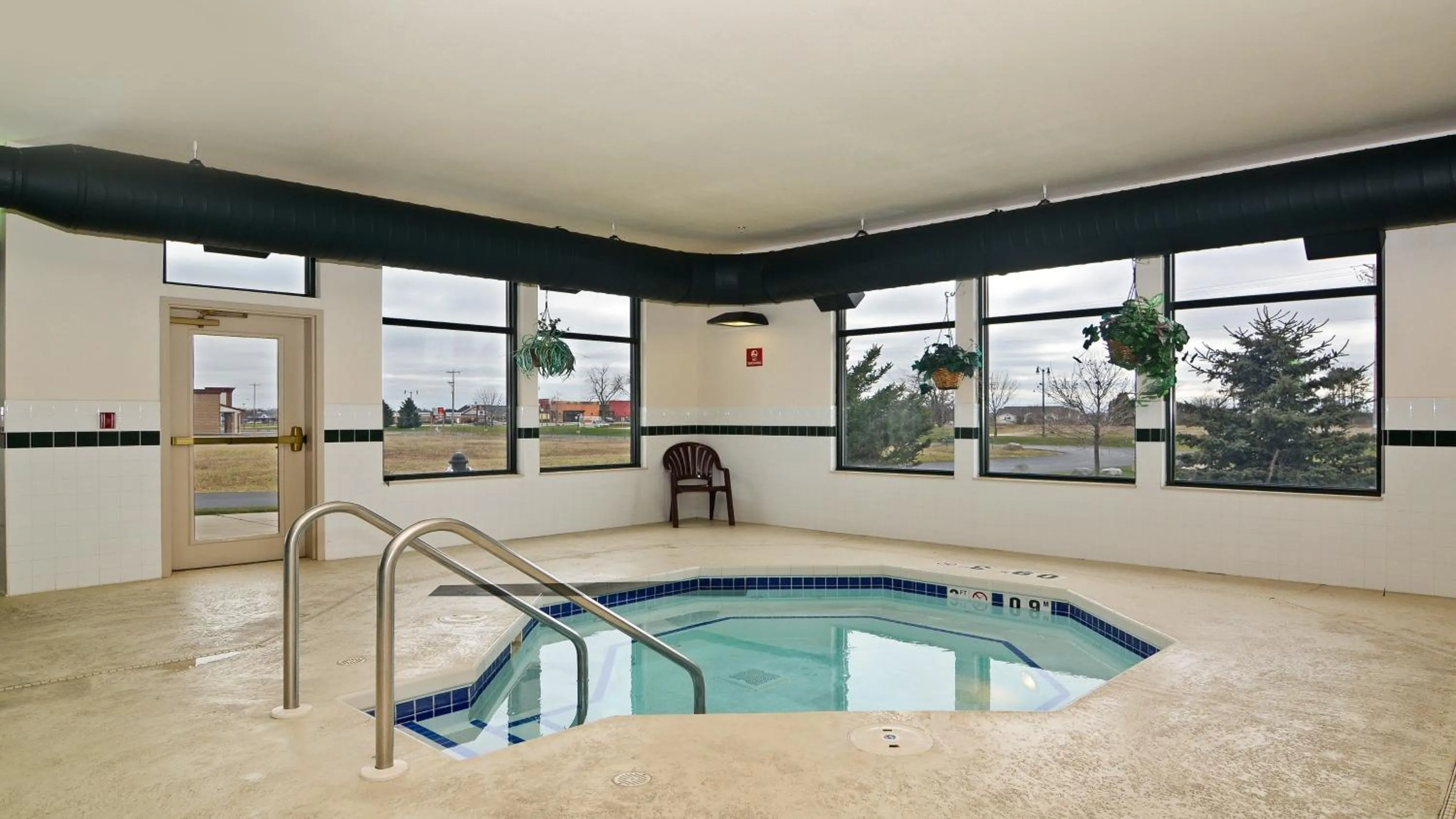 Swimming pool in Holiday Inn Express Hotel & Suites Fort Atkinson by IHG