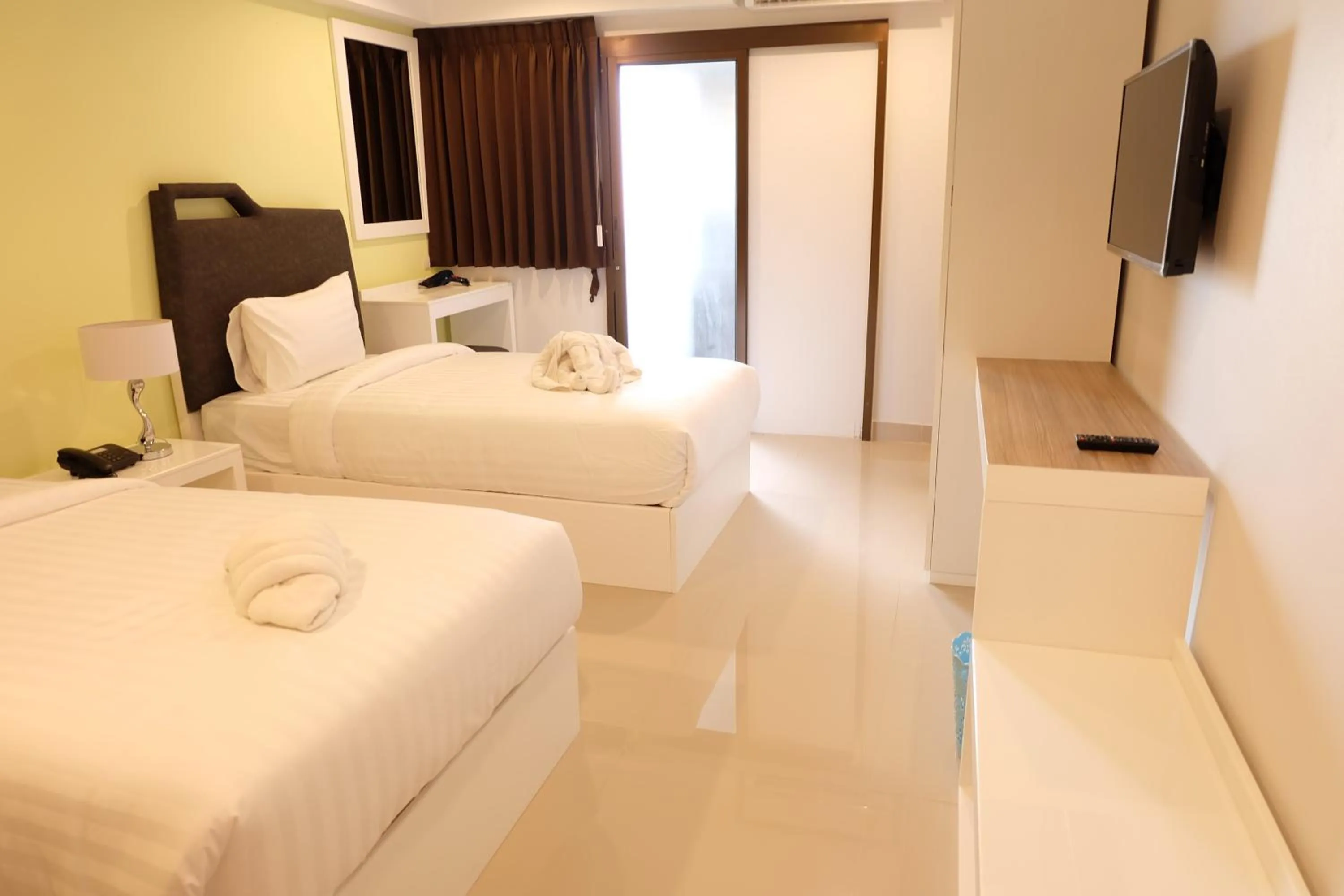 Photo of the whole room, Bed in Sunny Residence