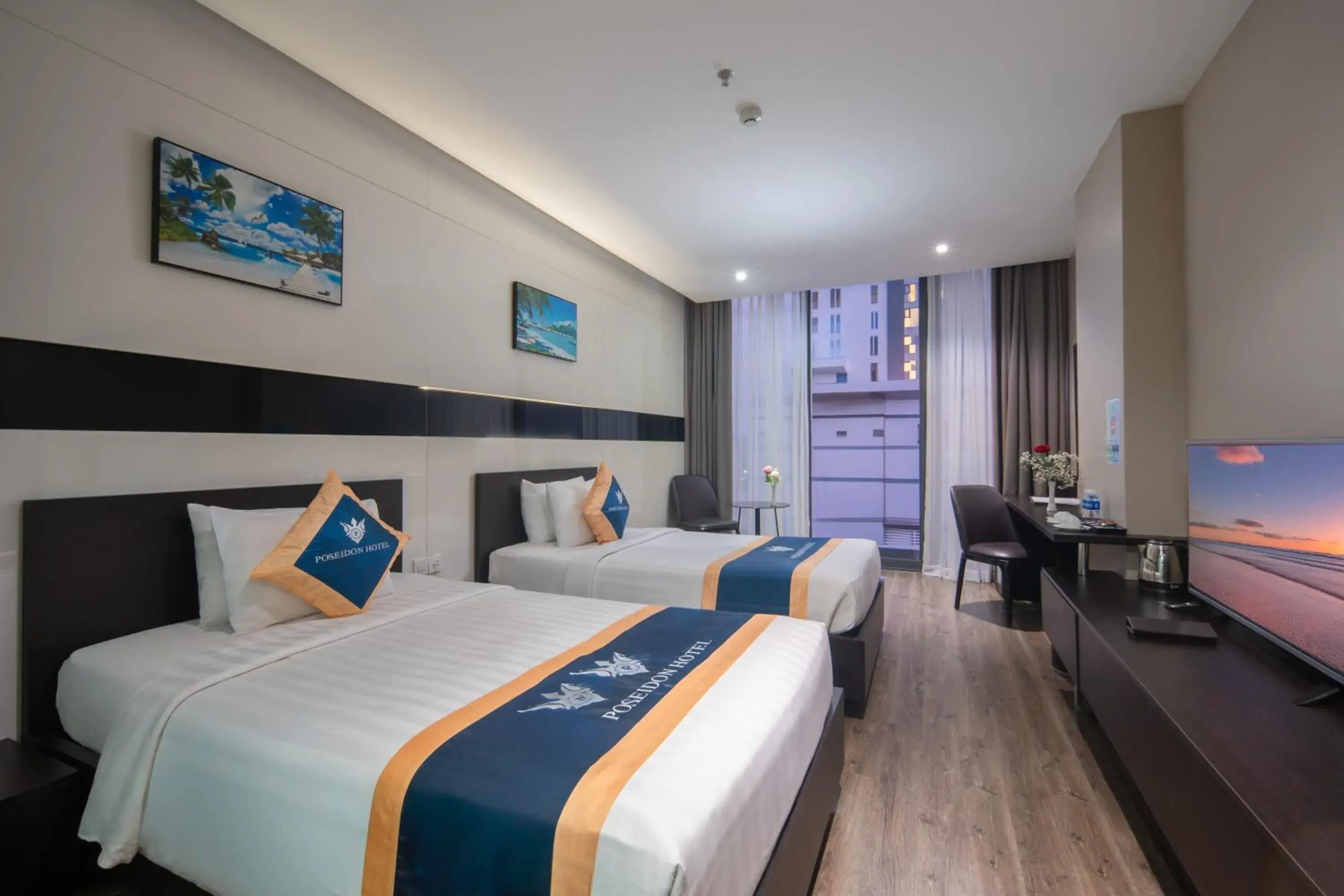 Deluxe Double or Twin Room with City View in Poseidon Nha Trang Hotel Deluxe Double or Twin Room with City View in Poseidon Nha Trang Hotel