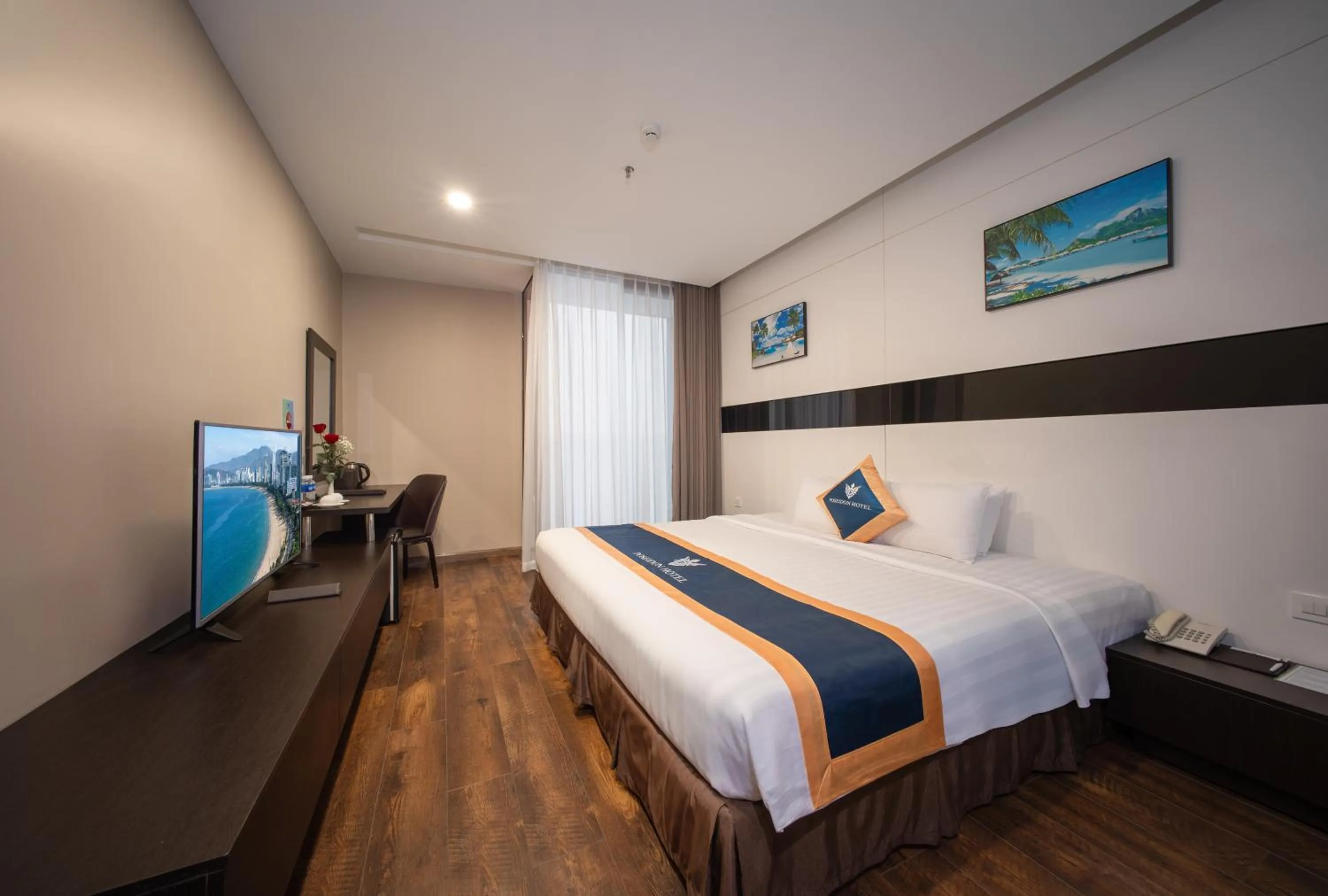 Bed in Poseidon Nha Trang Hotel