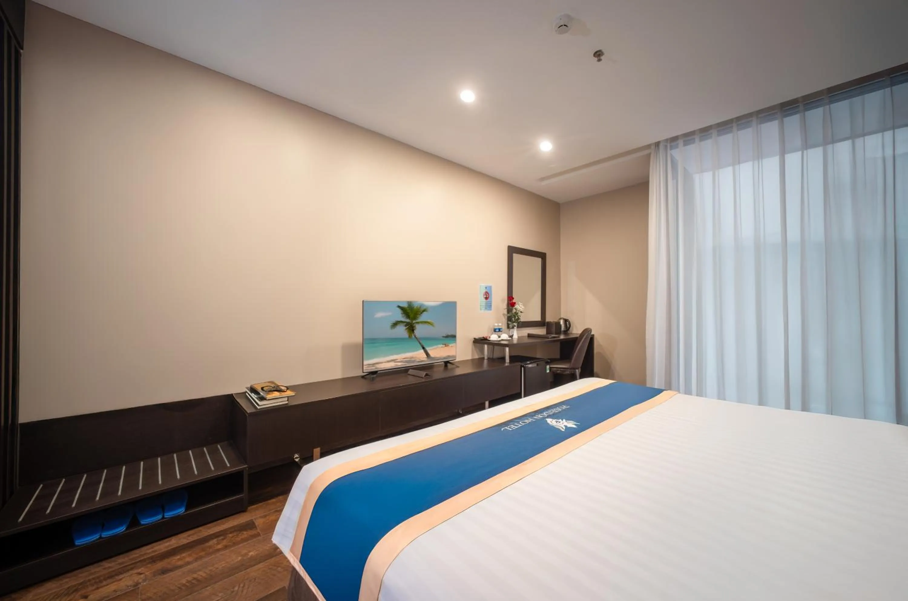 Bed in Poseidon Nha Trang Hotel