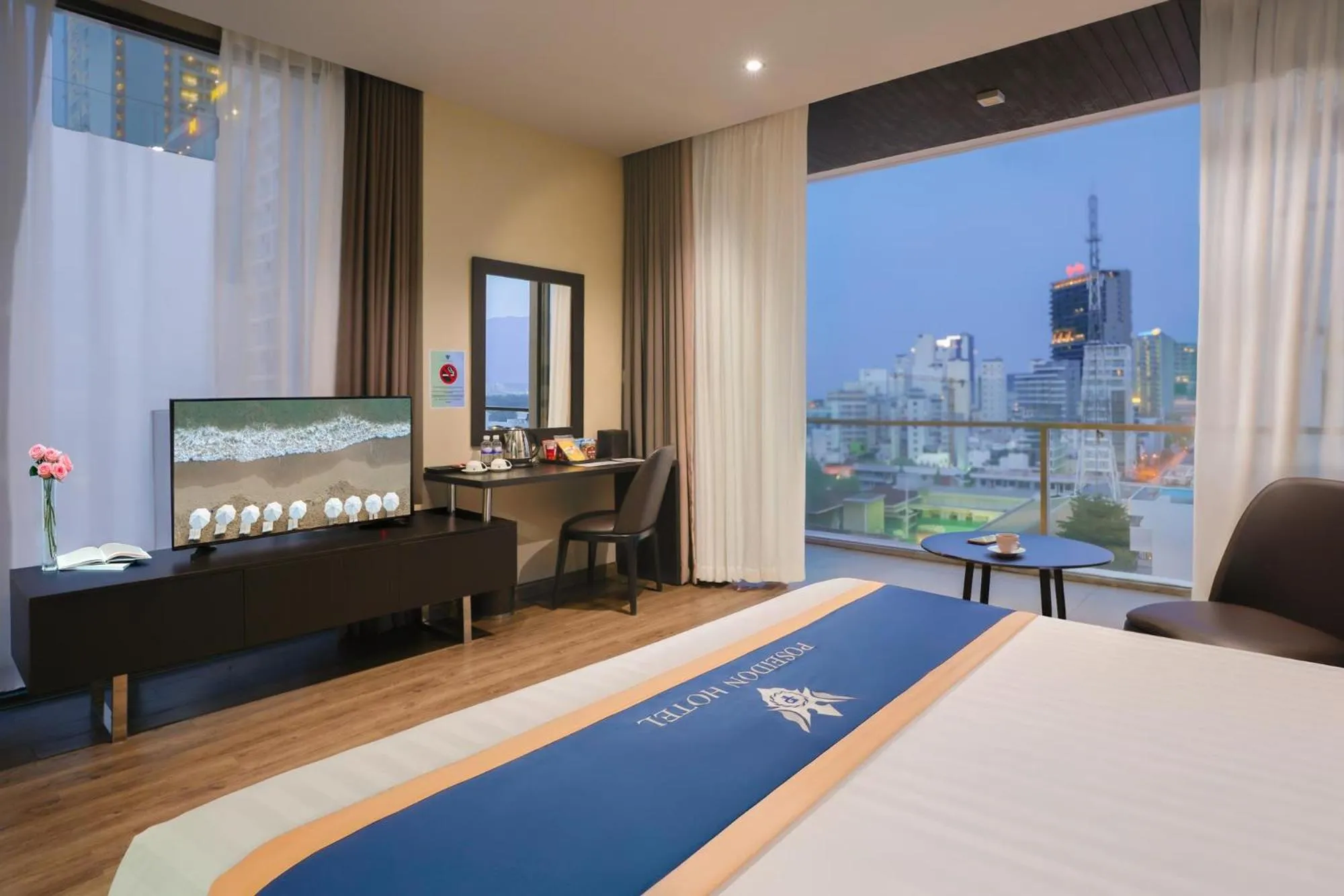 Bed in Poseidon Nha Trang Hotel