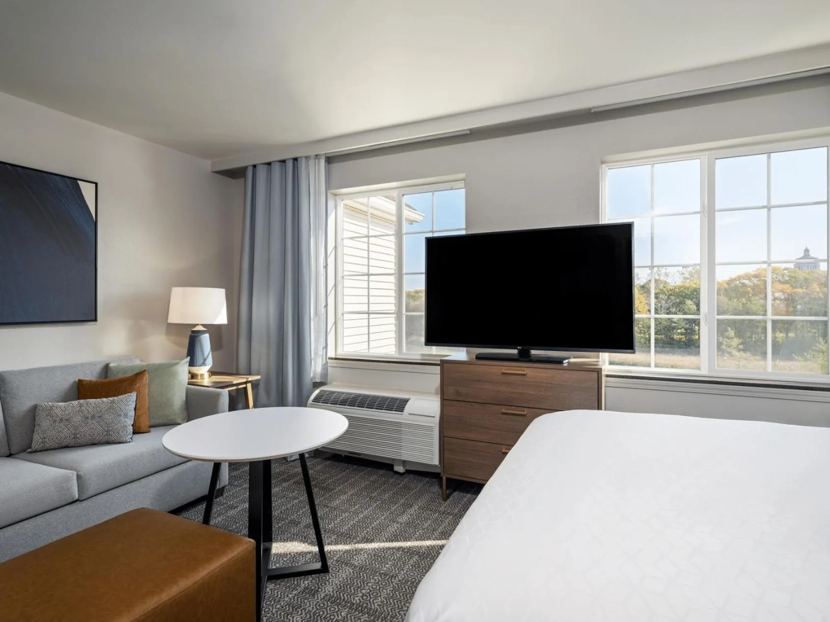 Living room, Bed in Staybridge Suites Rochester University by IHG
