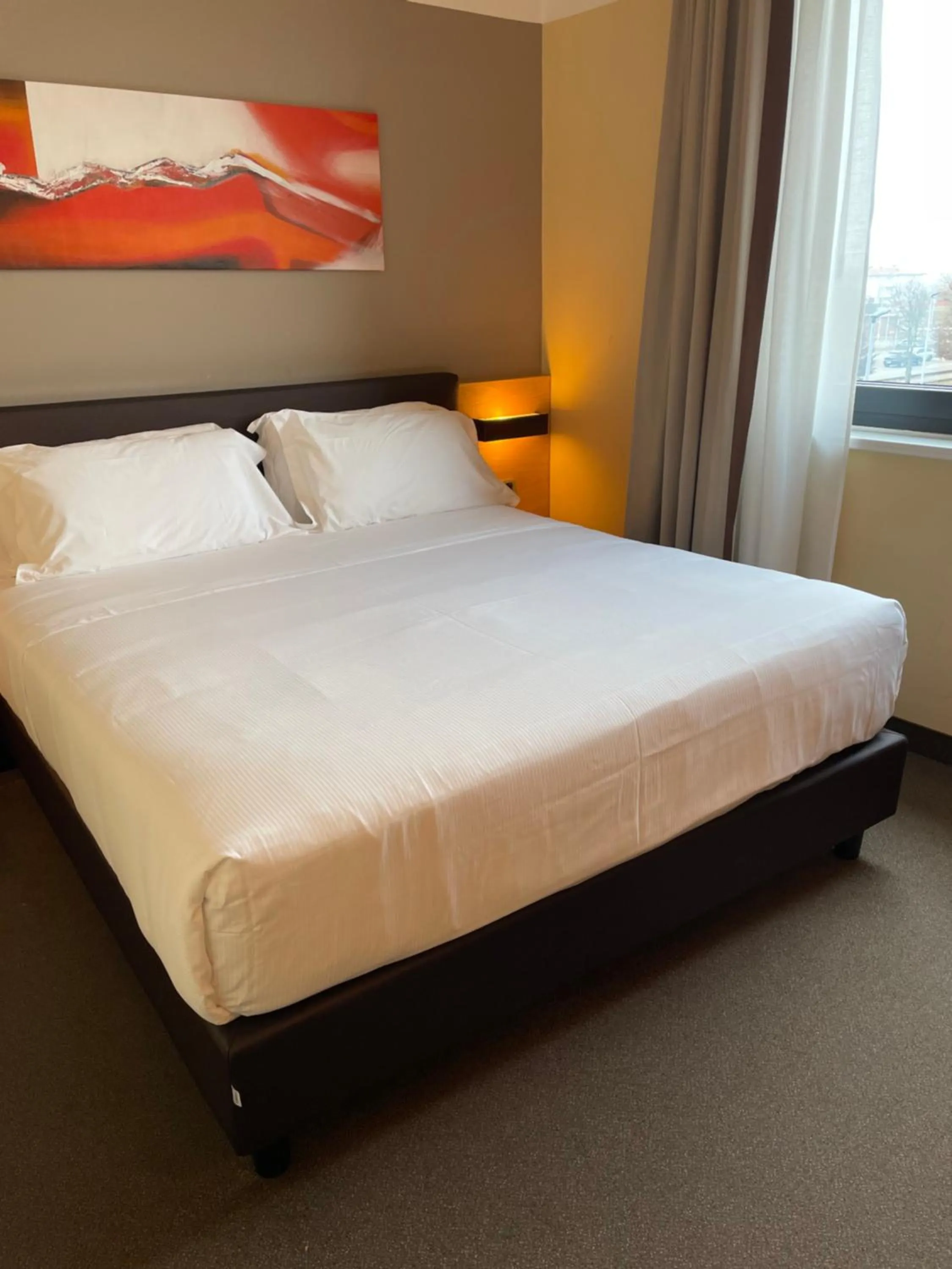 Bed in Hotel Omnia
