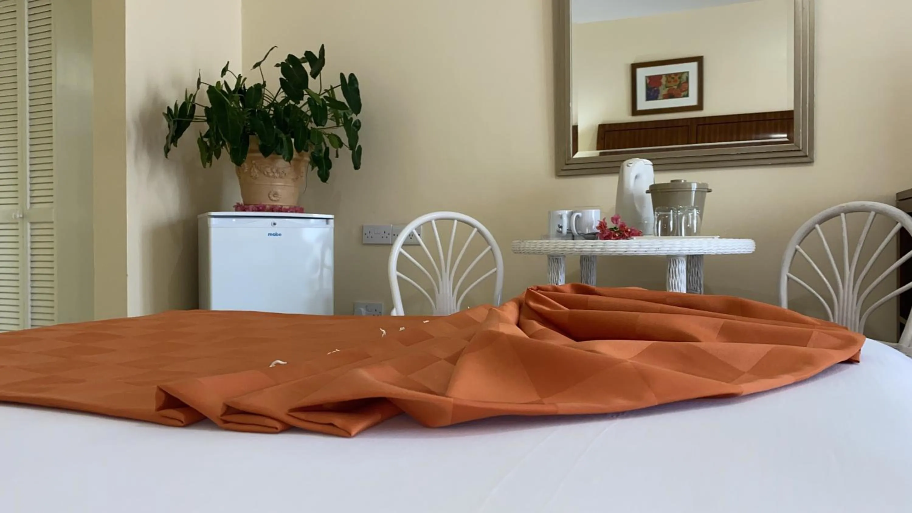 Bed in Bay Gardens Inn