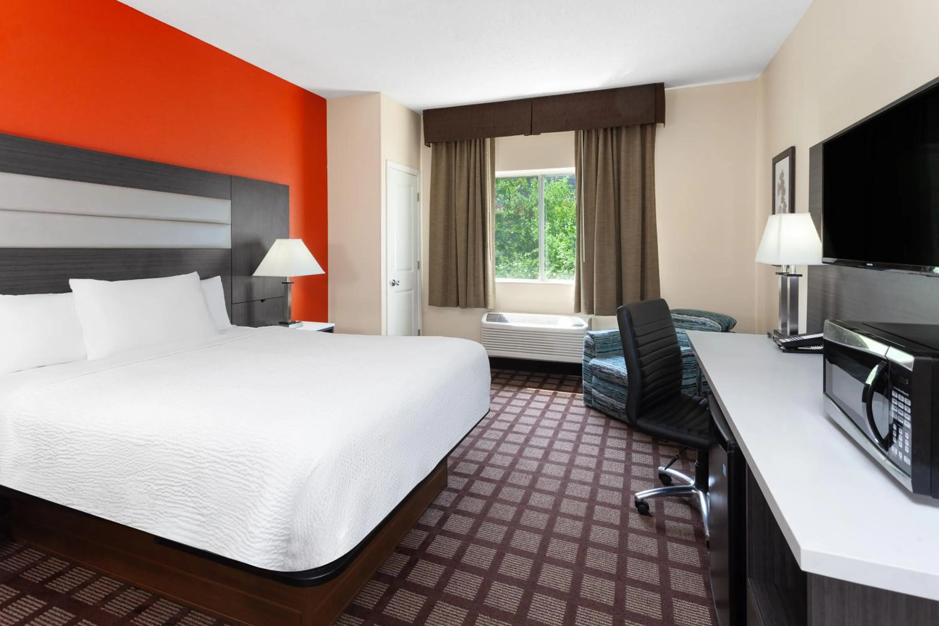 Bedroom, Bed in AmericInn by Wyndham Hudson