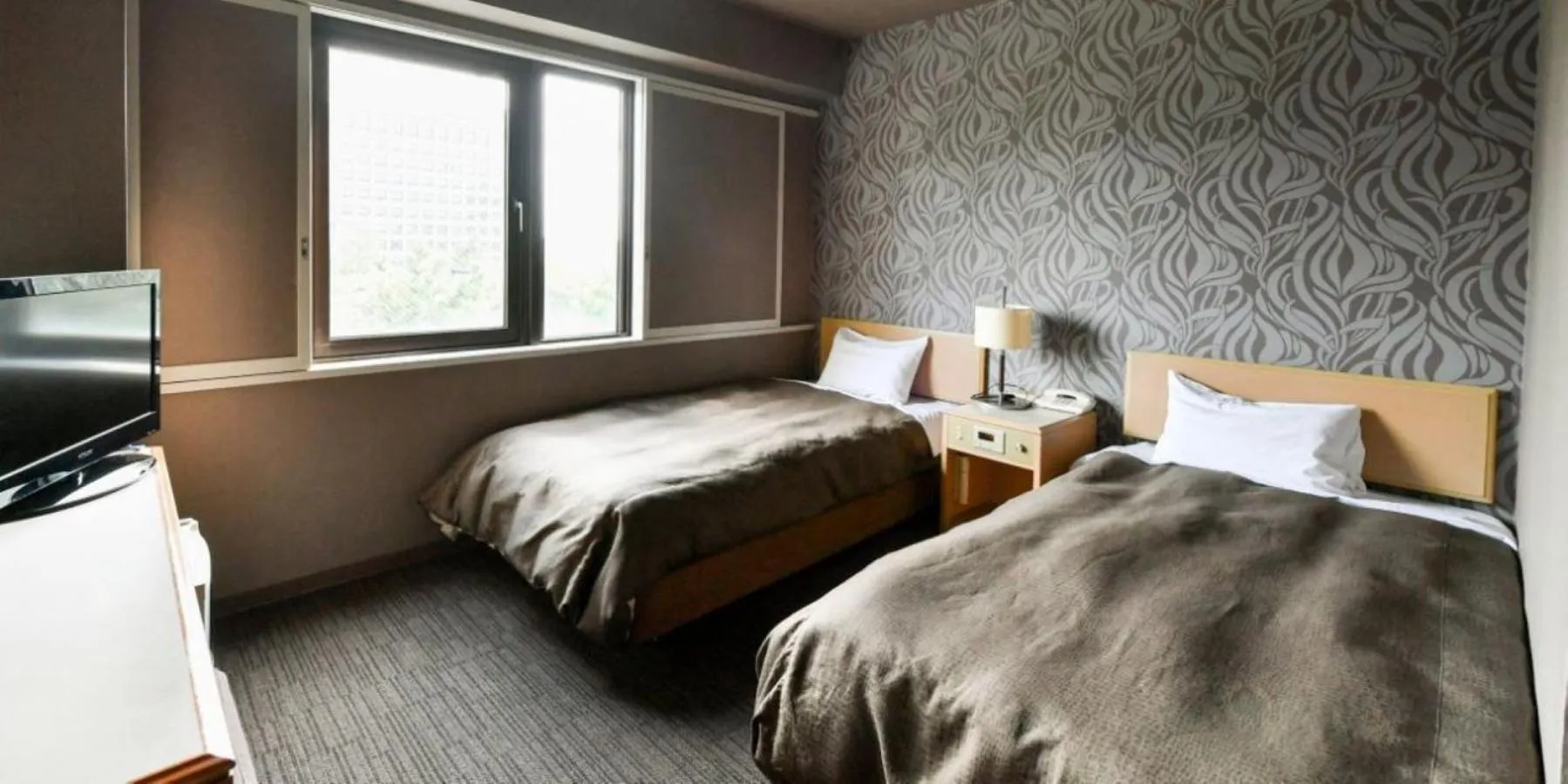 Bed in Okazaki Daiichi Hotel