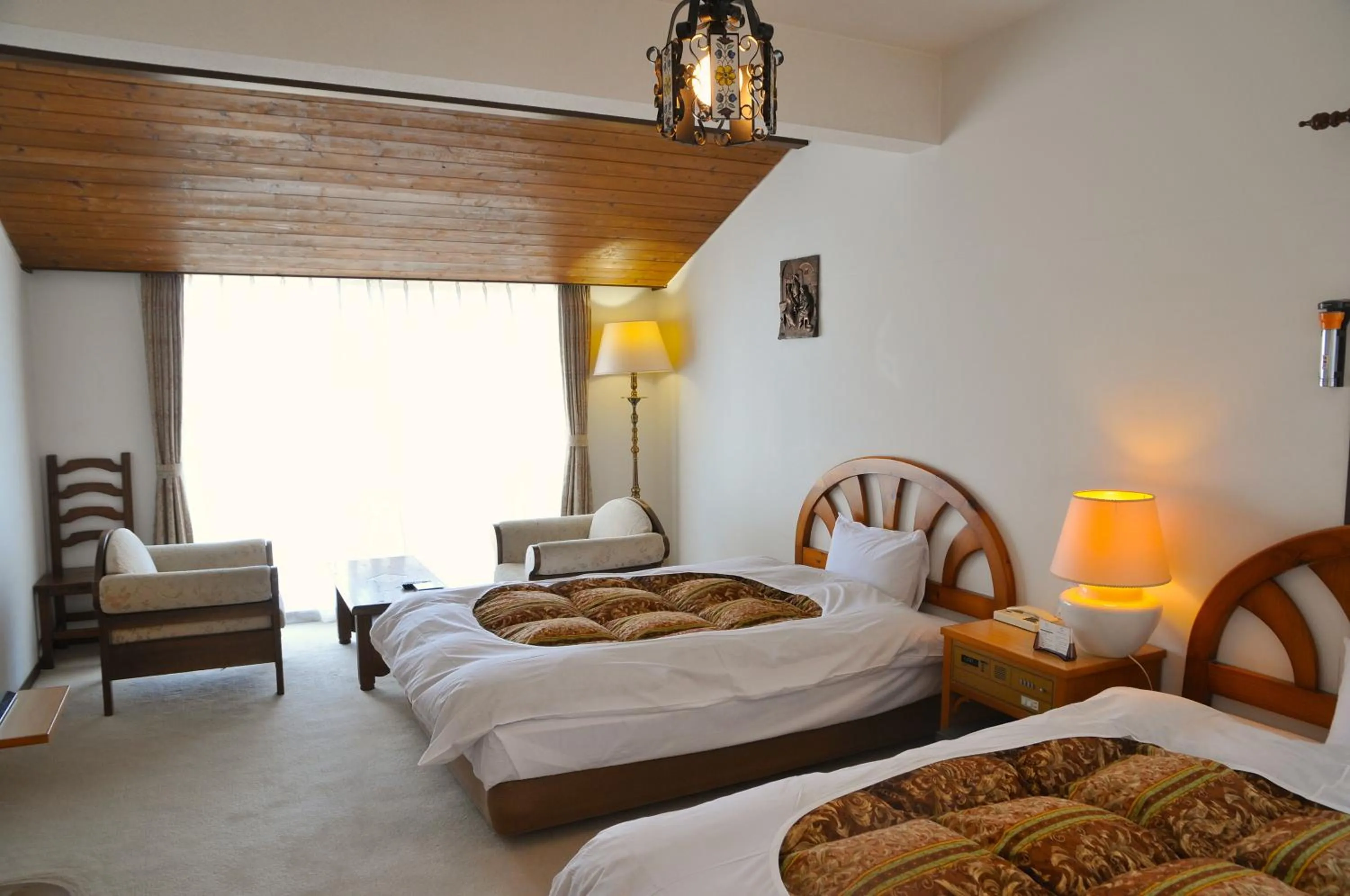 Photo of the whole room, Bed in Tateyama Resort Hotel