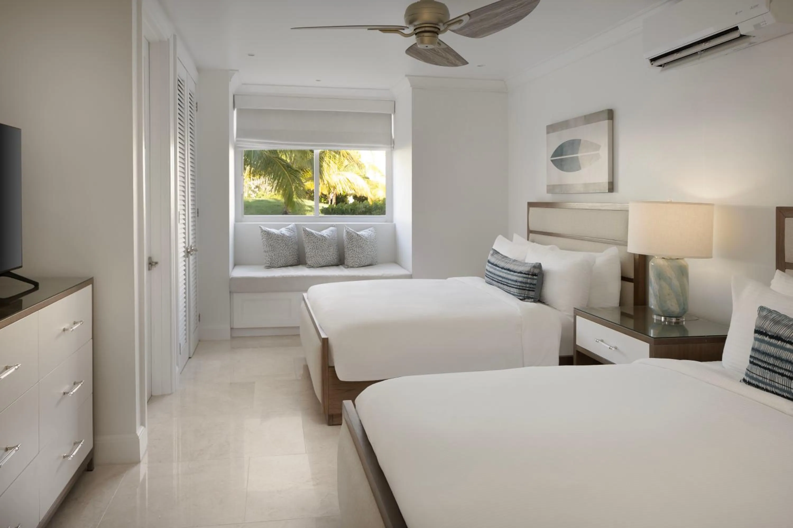 Bed in Windjammer Landing Resort and Residences