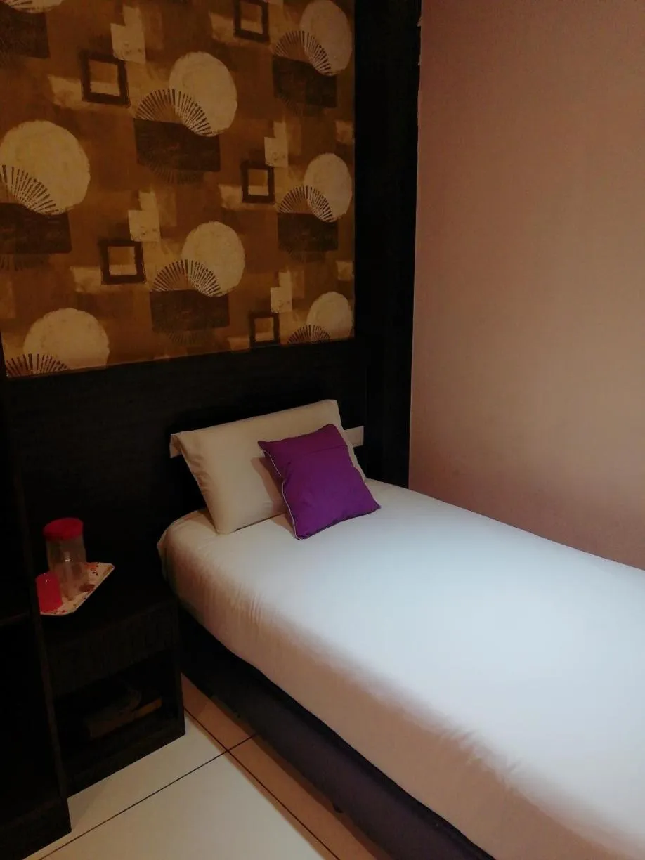 Bed in Remember Hotel Bukit Gambir