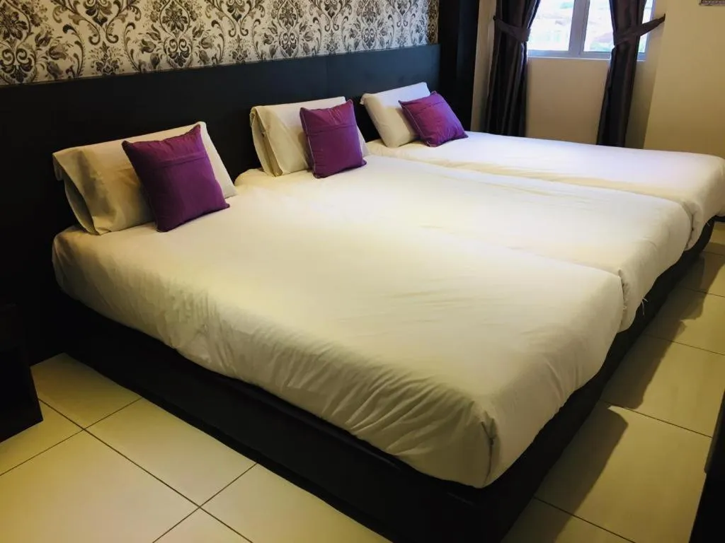 Bed in Remember Hotel Bukit Gambir