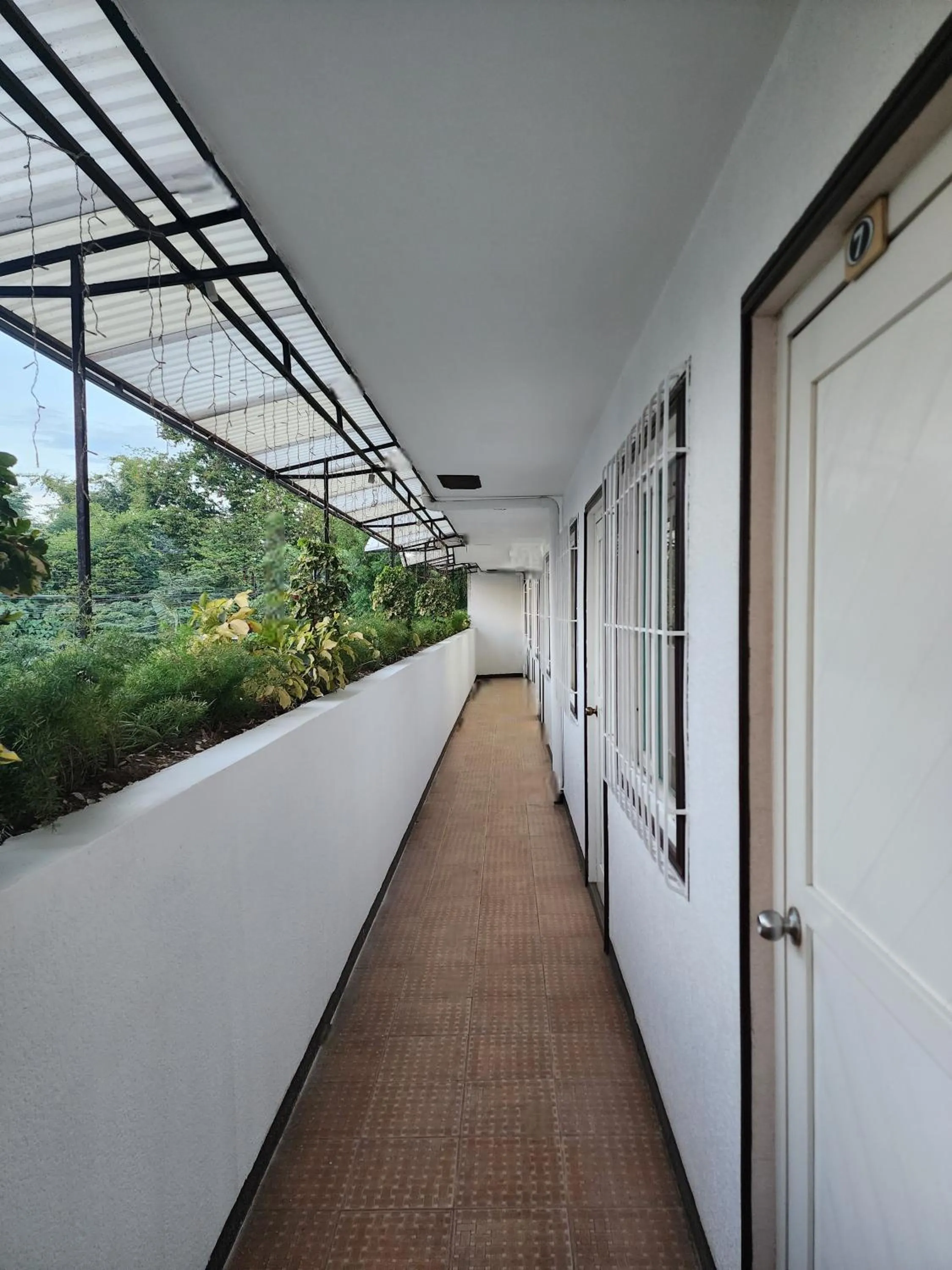 Property building in MB's Garden Inn