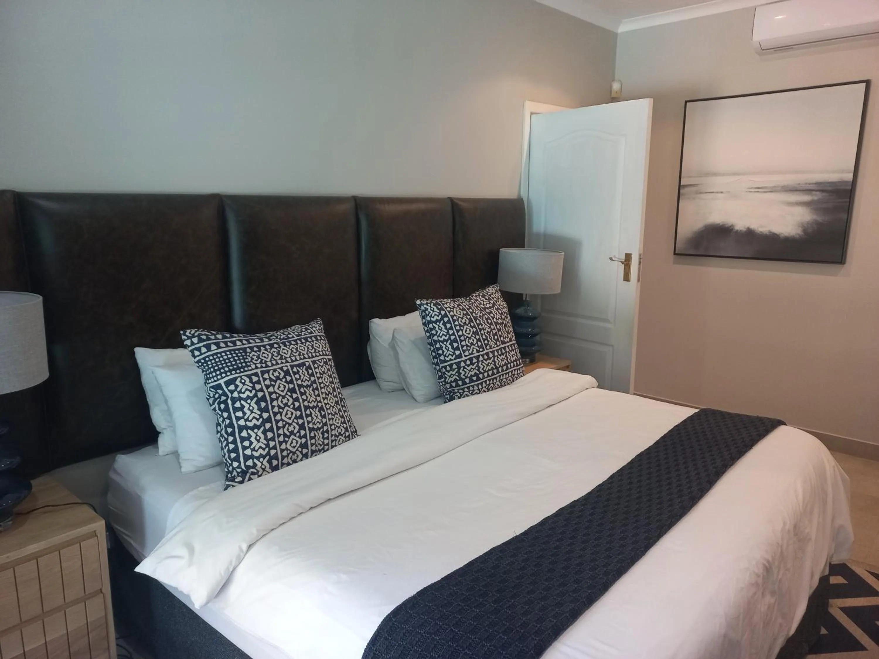 Bed in Tropical Beach Boutique Guesthouse