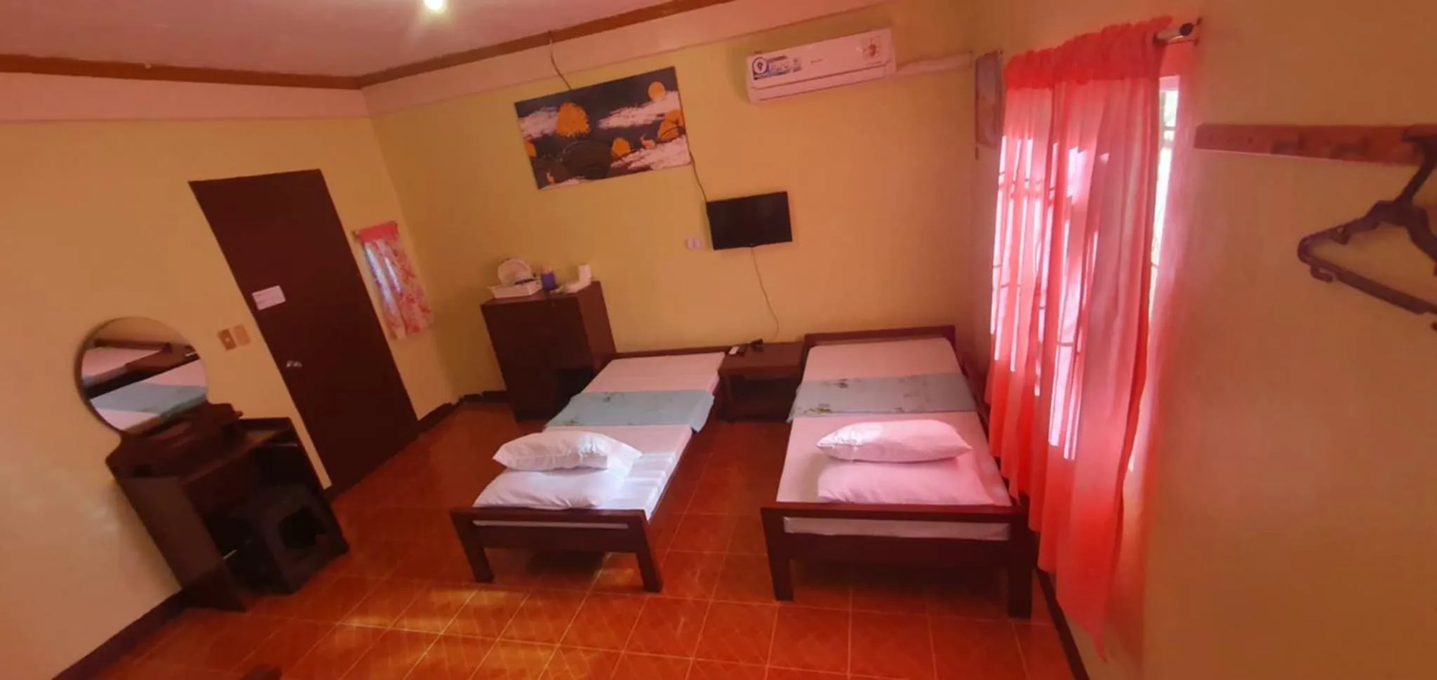 Bed in Bohol Sea Breeze Cottages and Resort