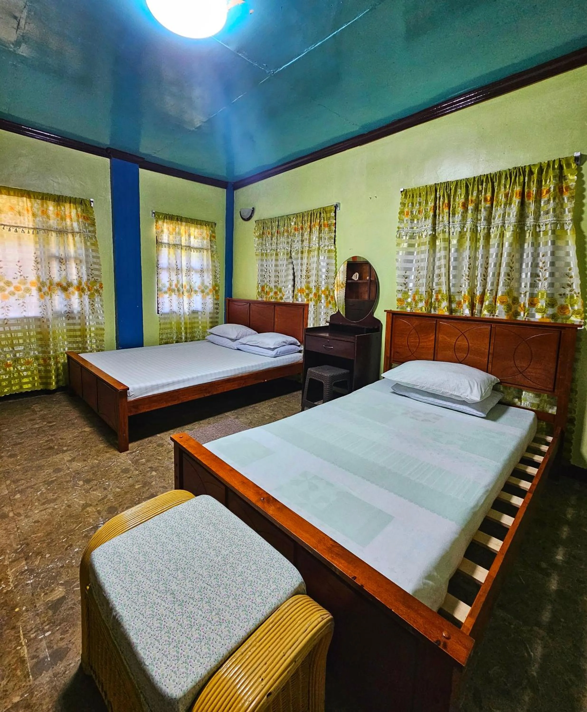 Bed in Bohol Sea Breeze Cottages and Resort