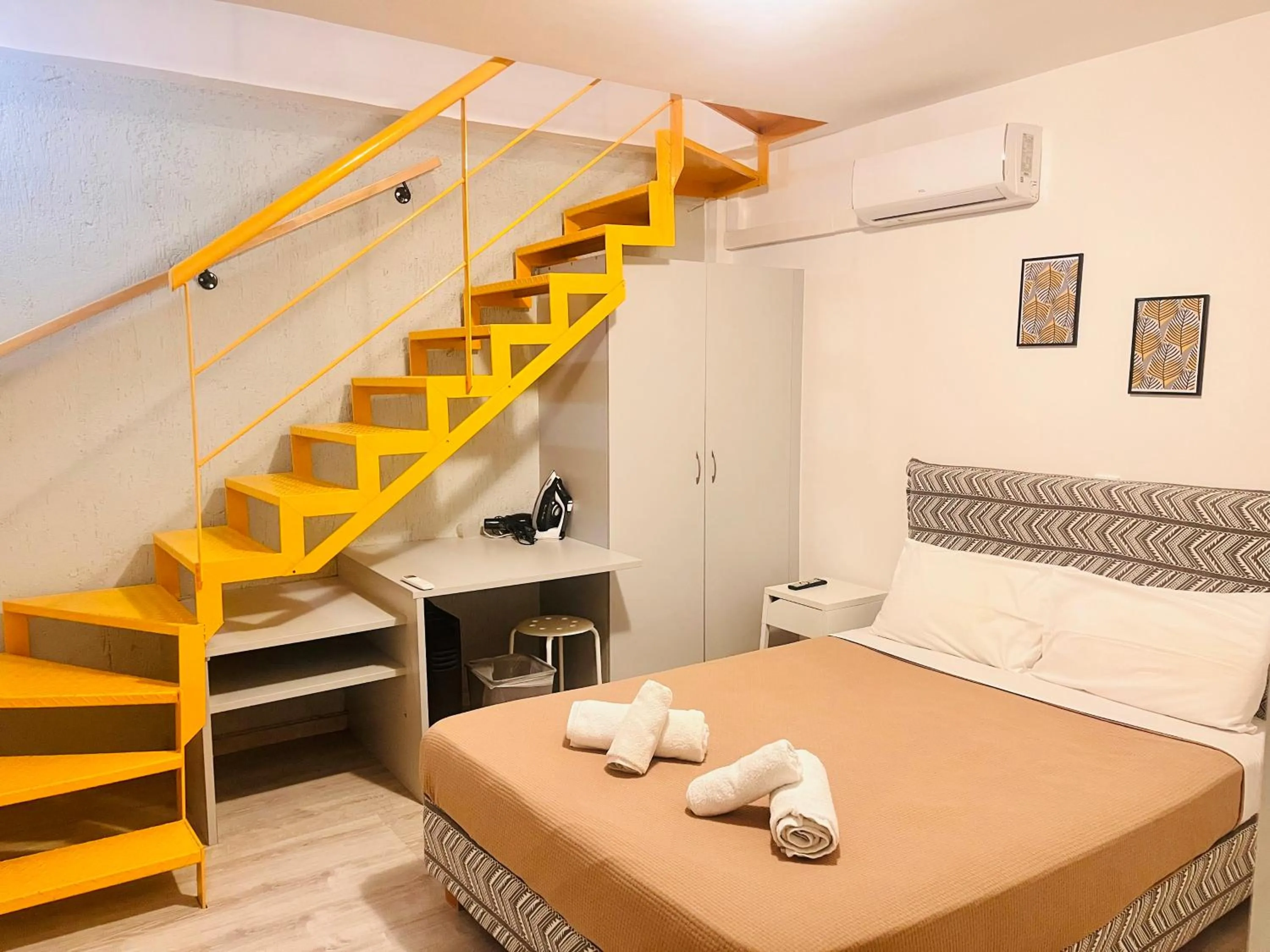 Bed in Elvita Apartments