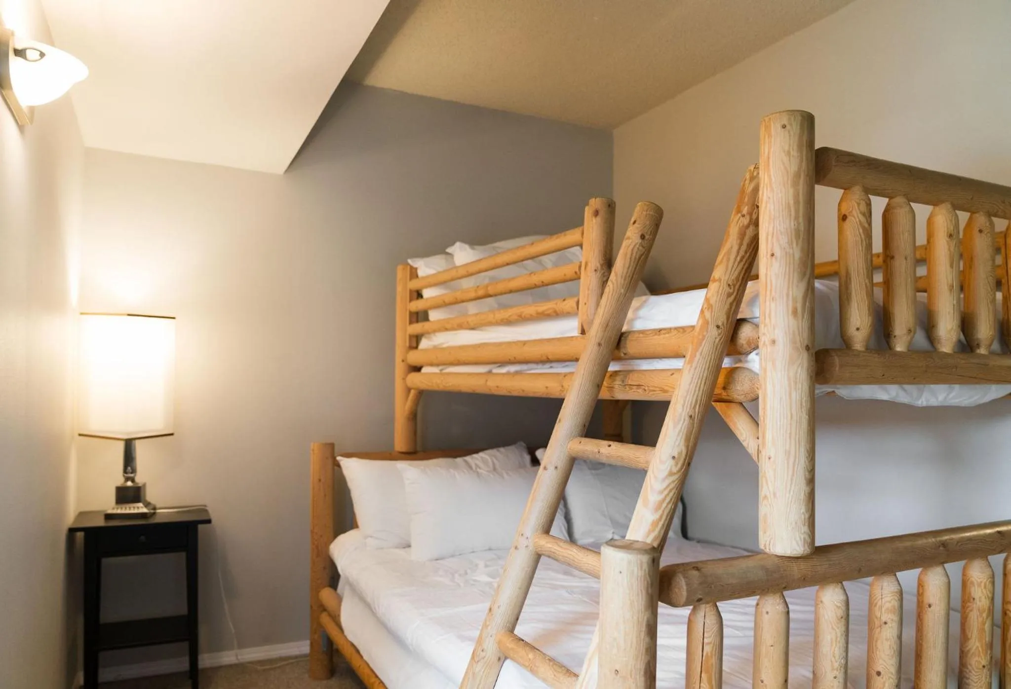 Bed in Gibbons Life Accommodations